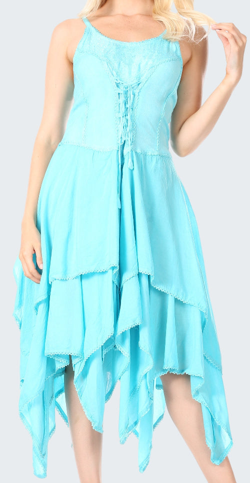 Woman wearing a light blue dress with a layered, hi-lo hem design.