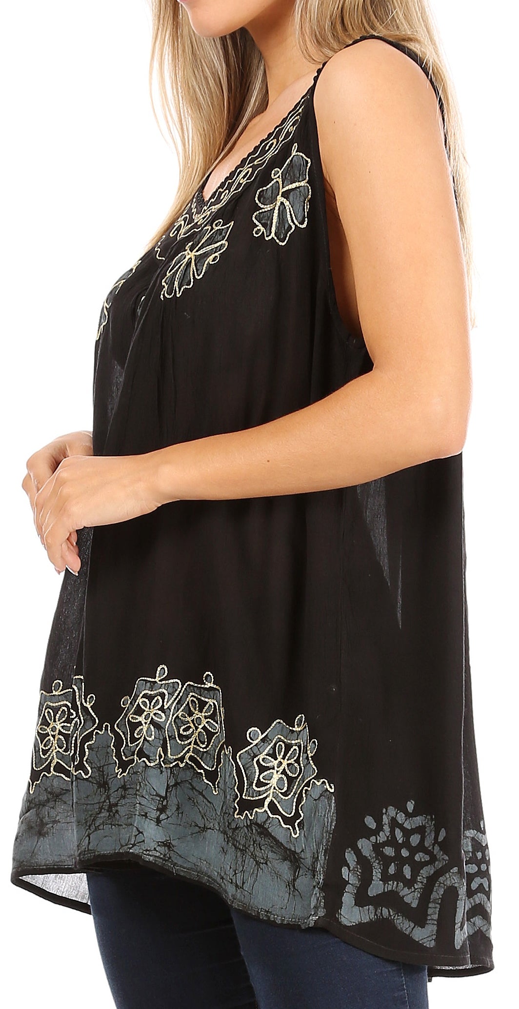 Black sleeveless top with white embroidery on a white background