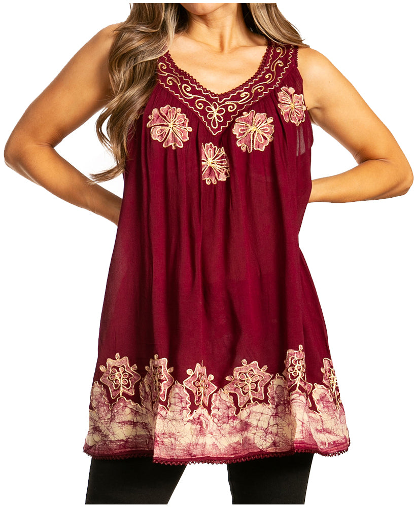 Red sleeveless top with floral embroidery on a white background