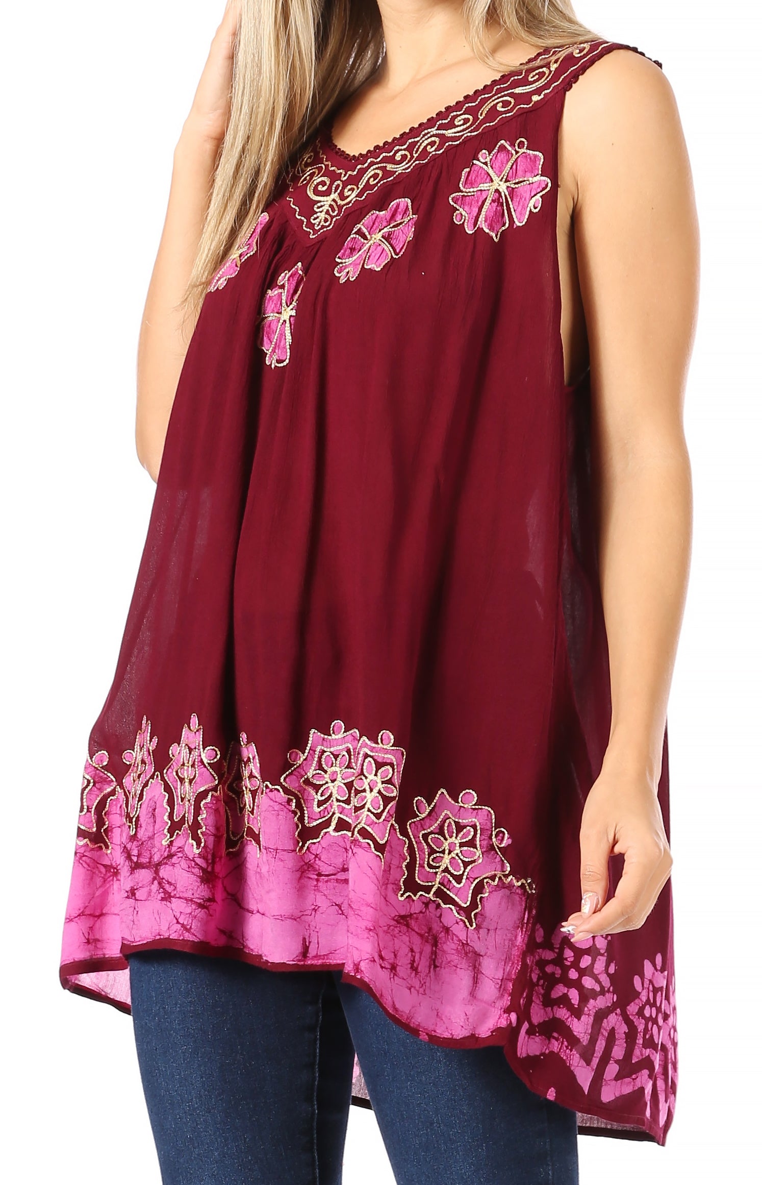 Maroon sleeveless top with pink floral embroidery worn by a person on a white background