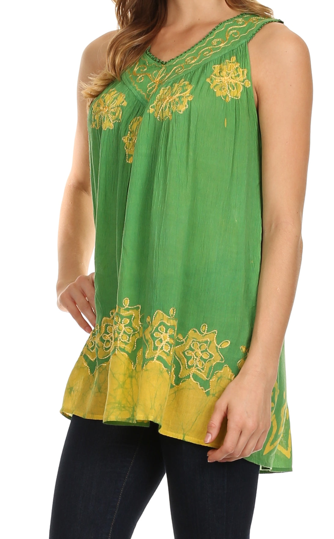 Green sleeveless top with yellow floral embroidery worn by a model on a white background