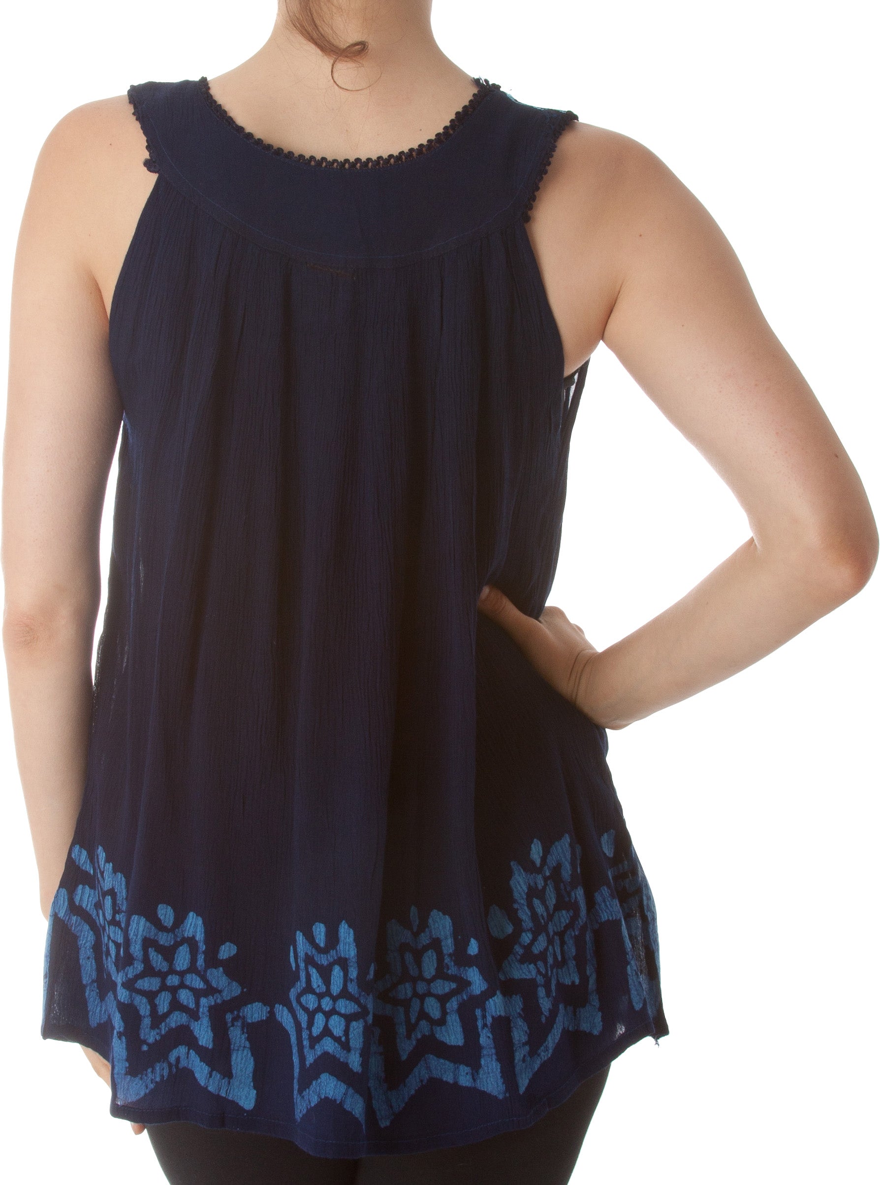 Navy sleeveless top with blue patterned hem on a white background