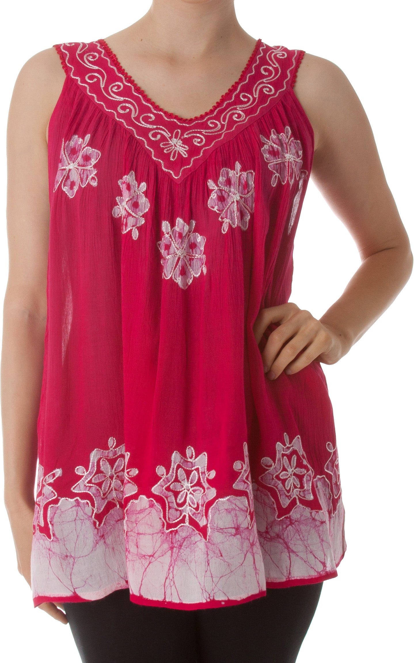 Red sleeveless top with white floral embroidery on a white background
