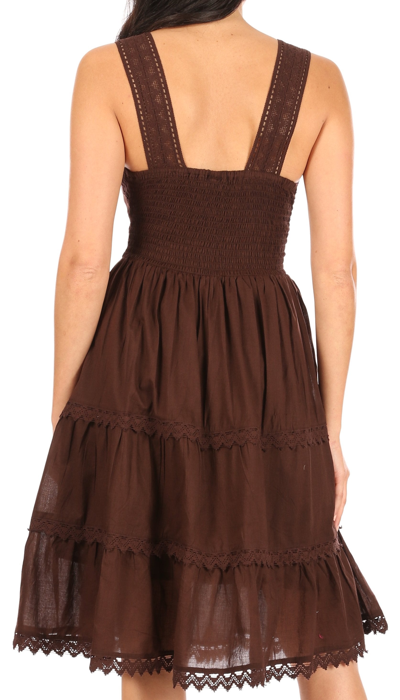 Brown dress with lace details on a white background