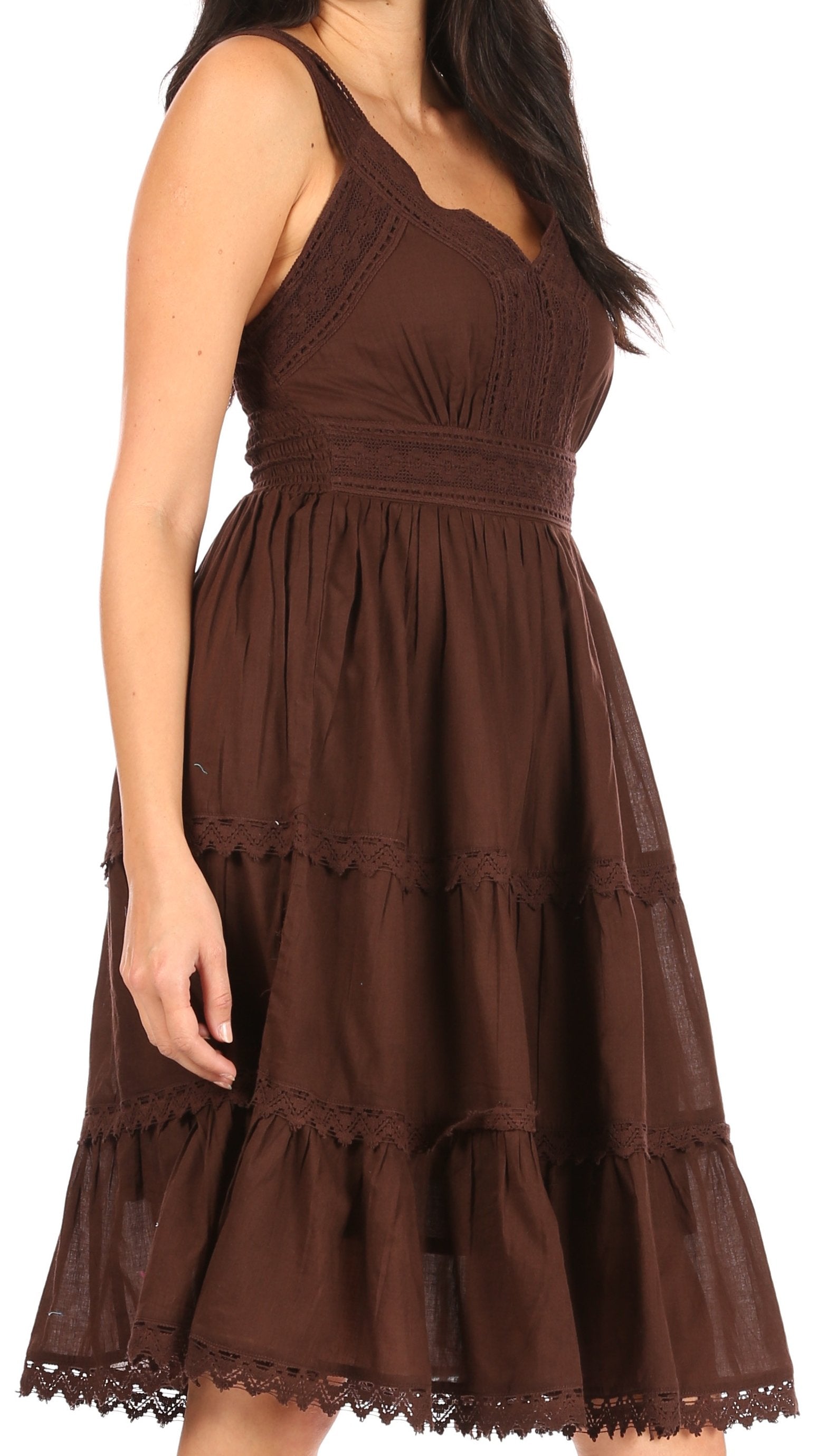 Brown dress with lace details on a white background