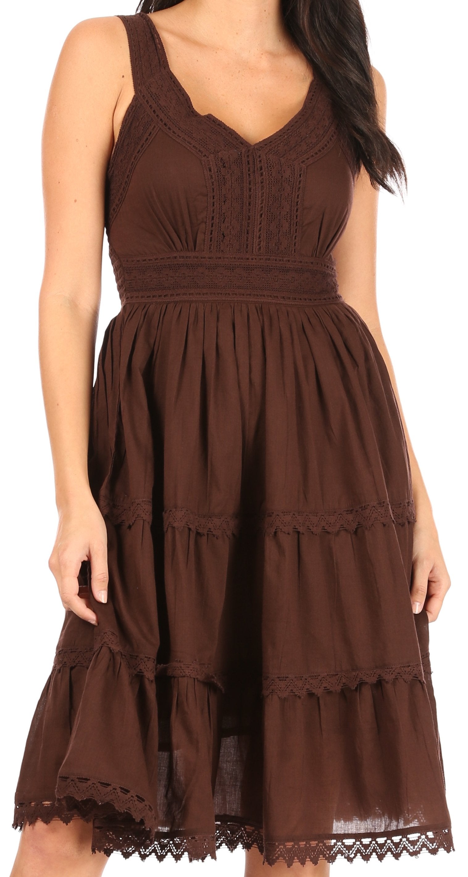 Brown dress with lace details on a white background