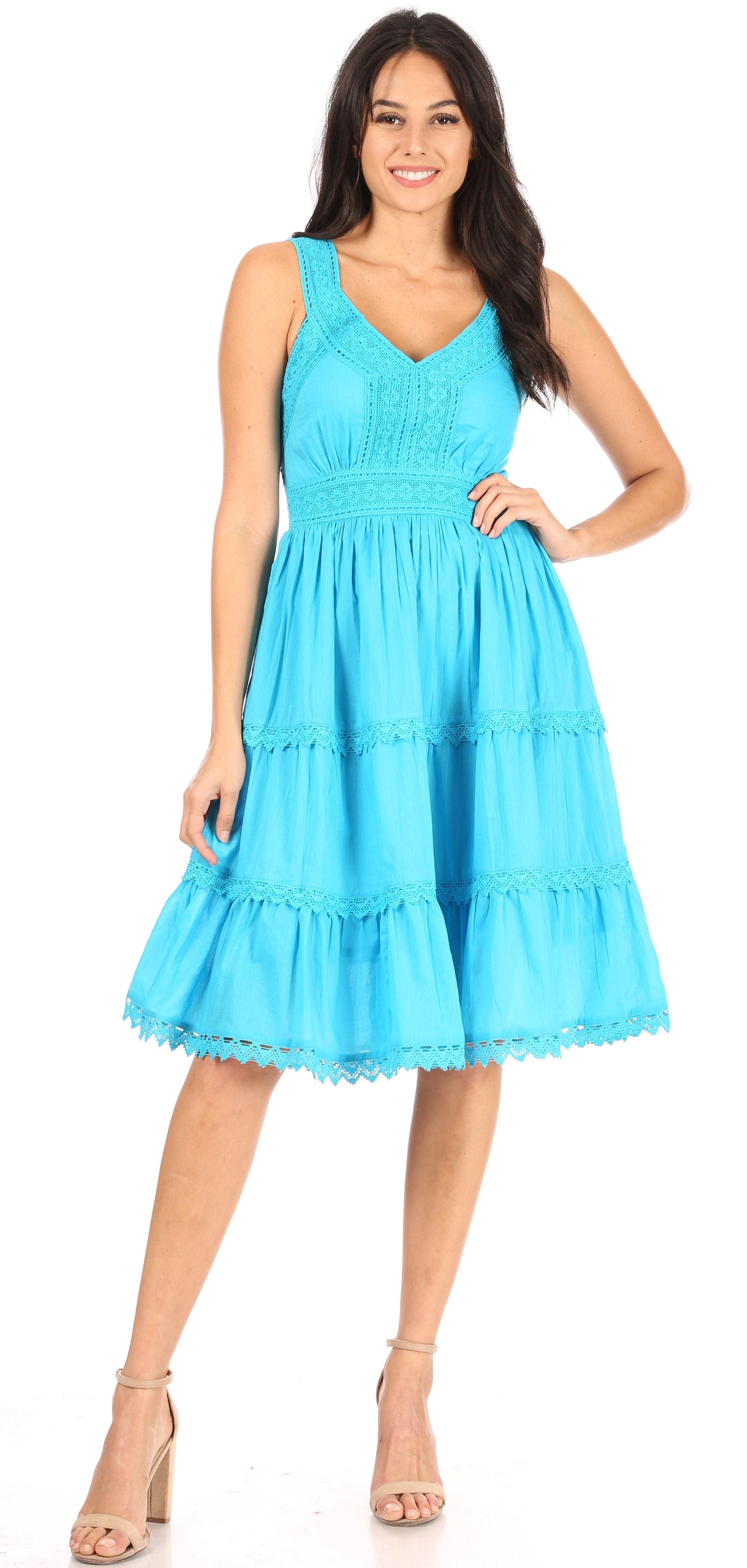 Woman wearing a blue dress on a white background