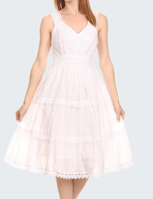 White dress with lace details on a white background