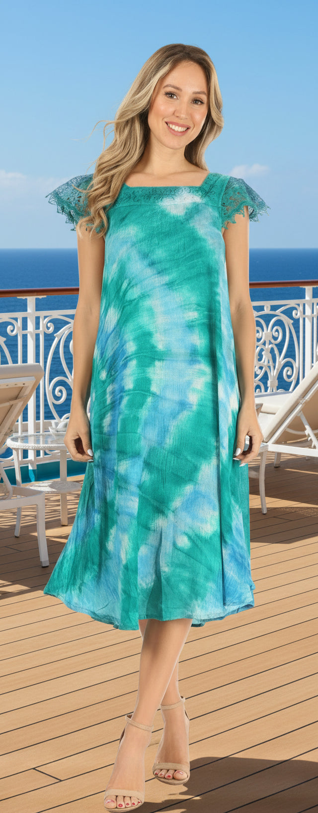 Woman wearing a tie-dye dress with a white background