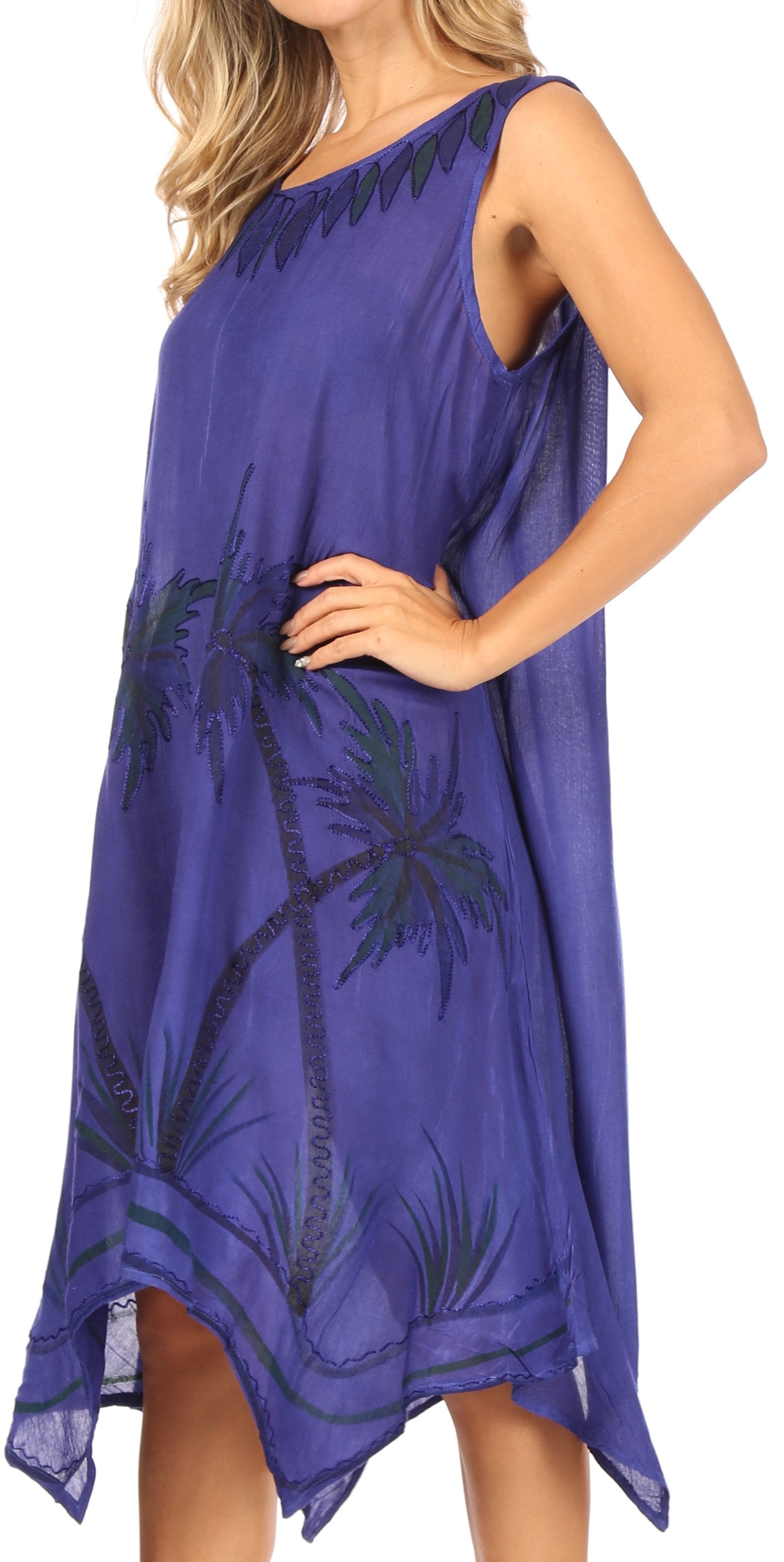 Purple dress with palm tree design worn by a model