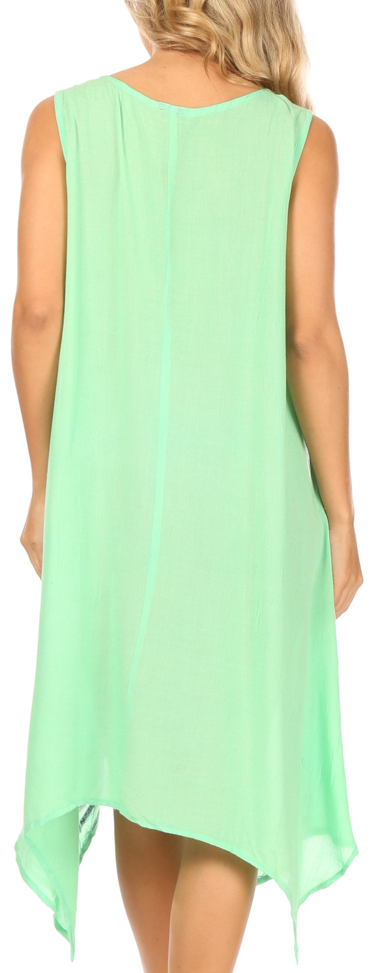 Light green sleeveless dress worn by a person on a white background