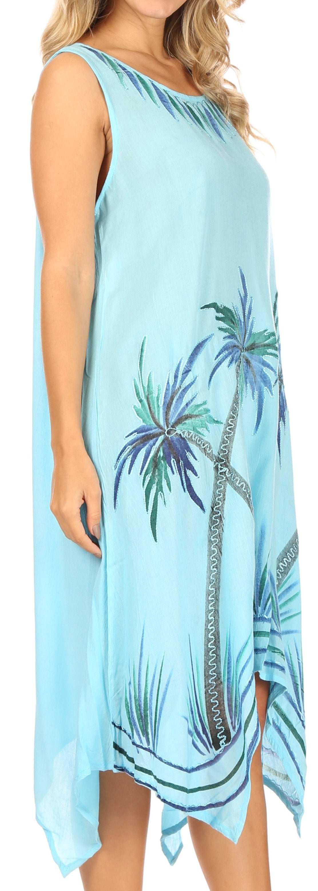 Light blue dress with palm tree design worn by a person