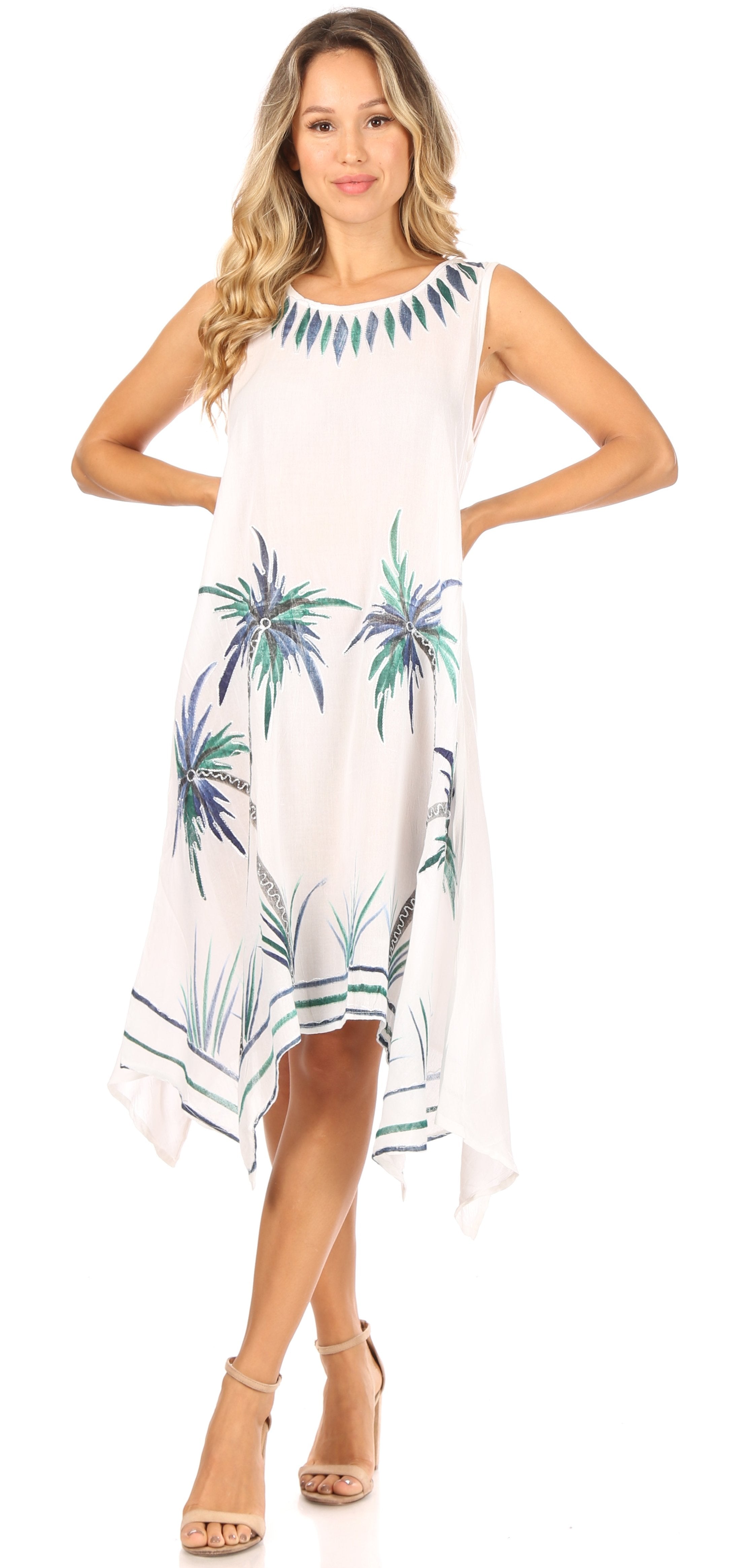 Woman wearing a white dress with palm tree patterns on a white background