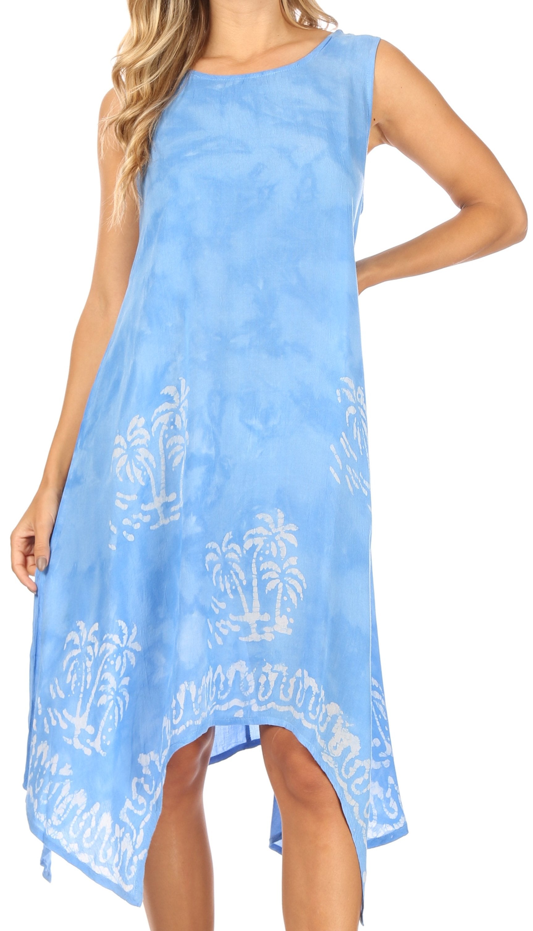 Woman wearing a light blue dress with white palm tree pattern on a white background