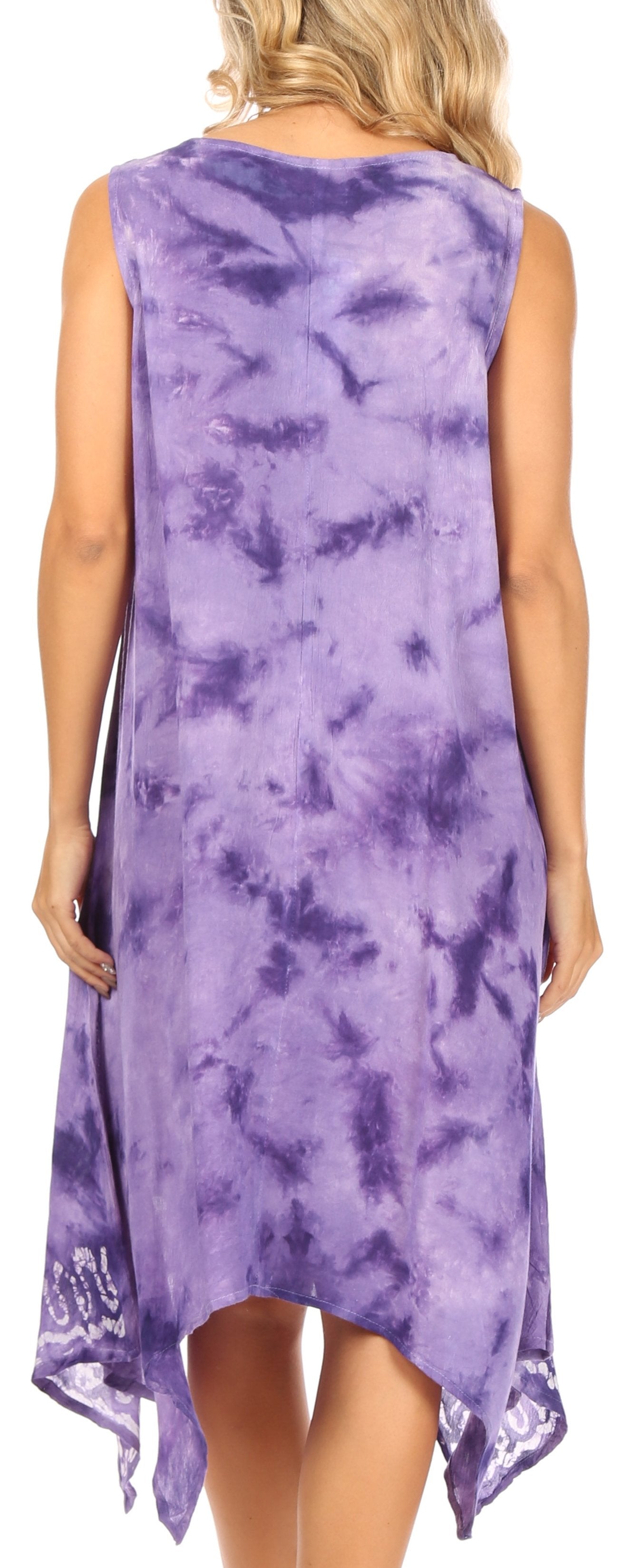 Woman wearing a sleeveless, tie-dye dress in purple and white.