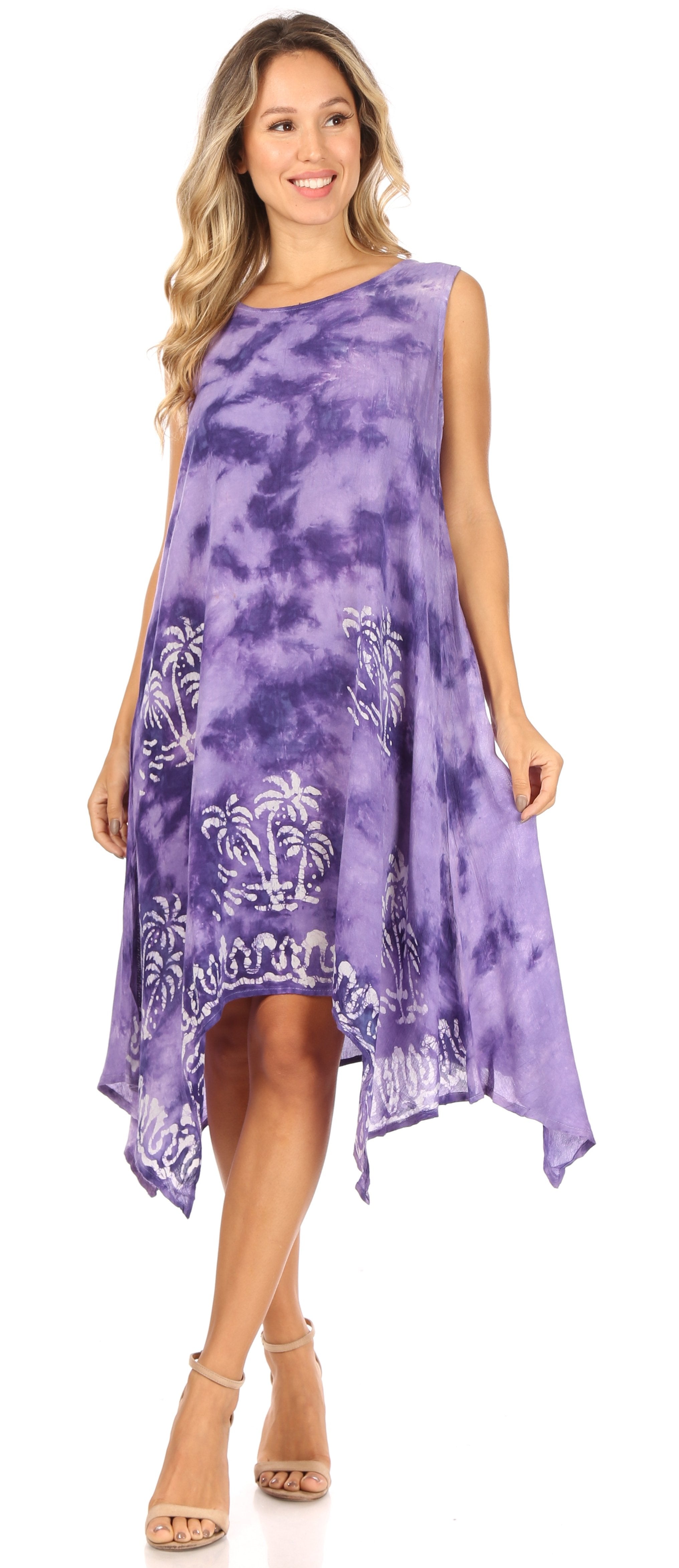 Woman wearing a purple tie-dye dress with a white floral pattern on a white background