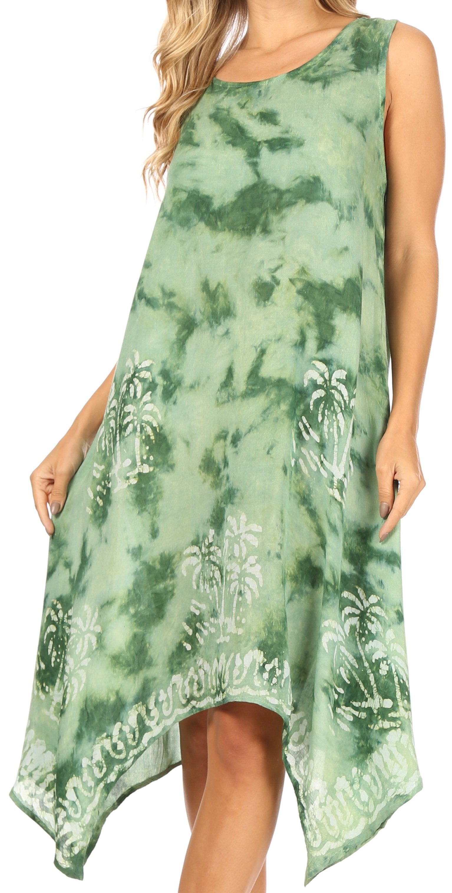 Green tie-dye dress with palm tree patterns on a white background