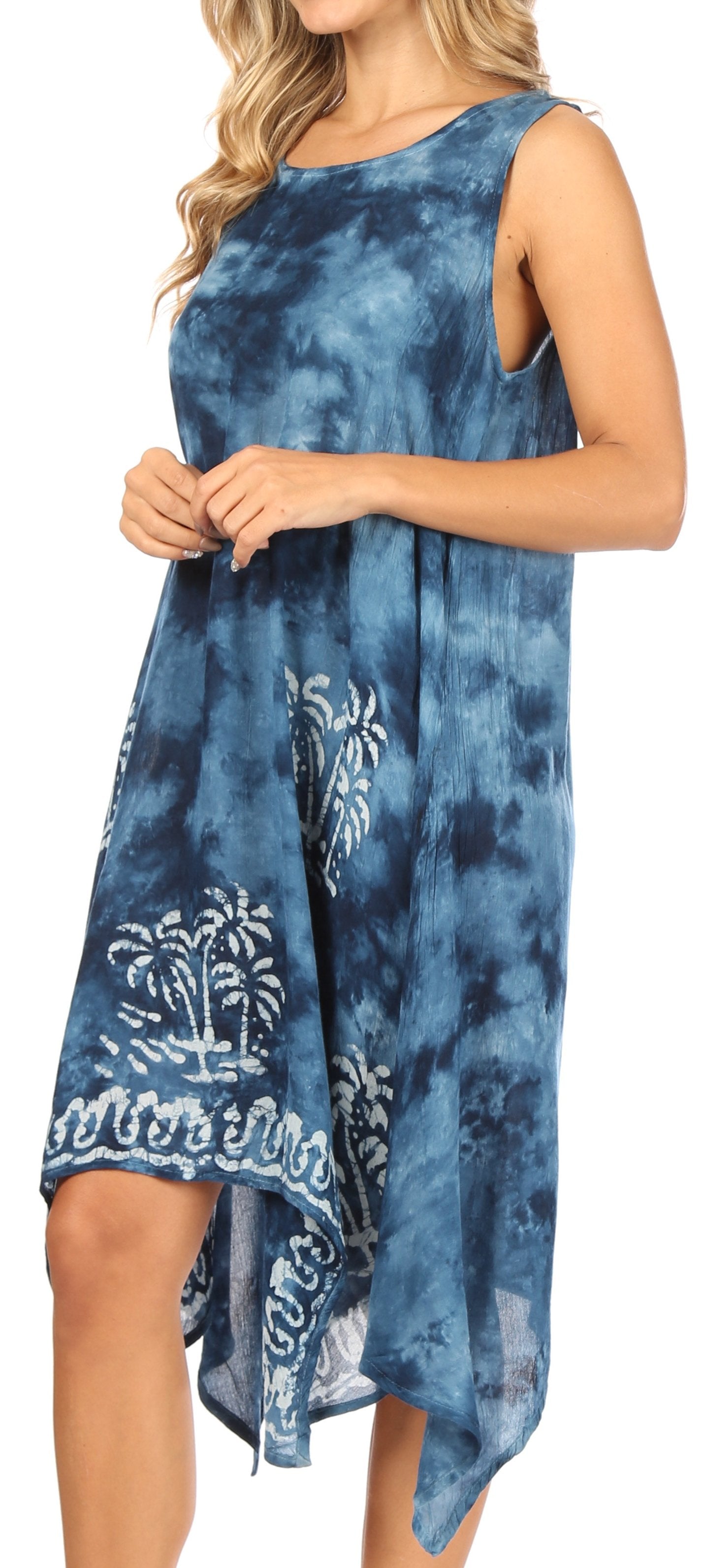 Woman wearing a blue tie-dye dress with white patterns