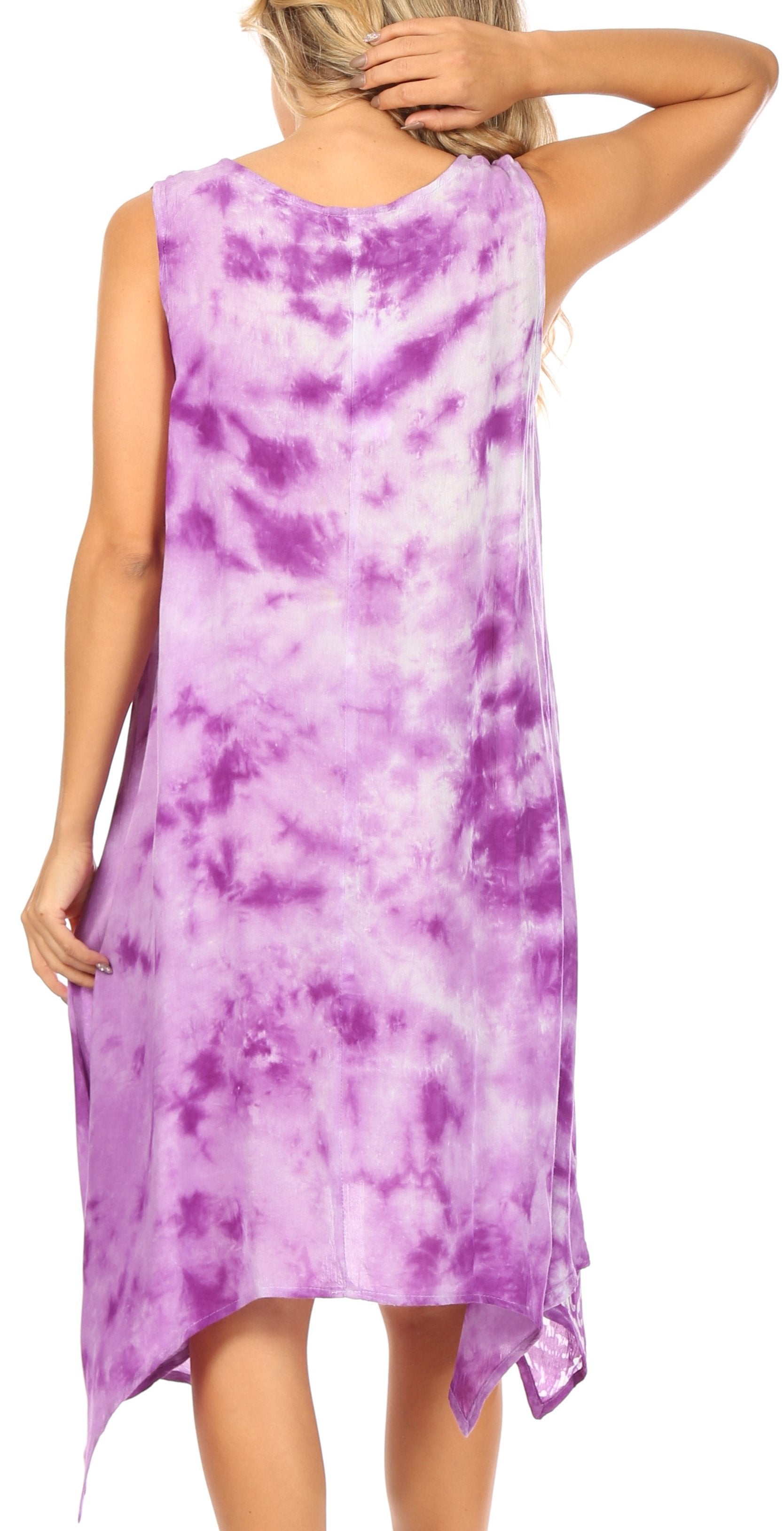 Woman wearing a purple tie-dye dress on a white background
