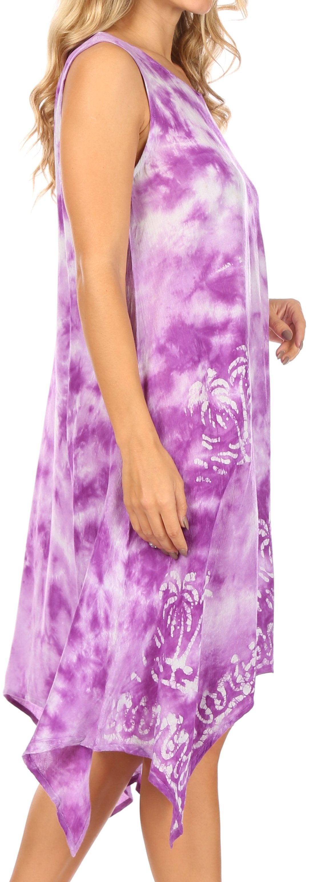 Woman wearing a purple tie-dye dress with floral patterns.