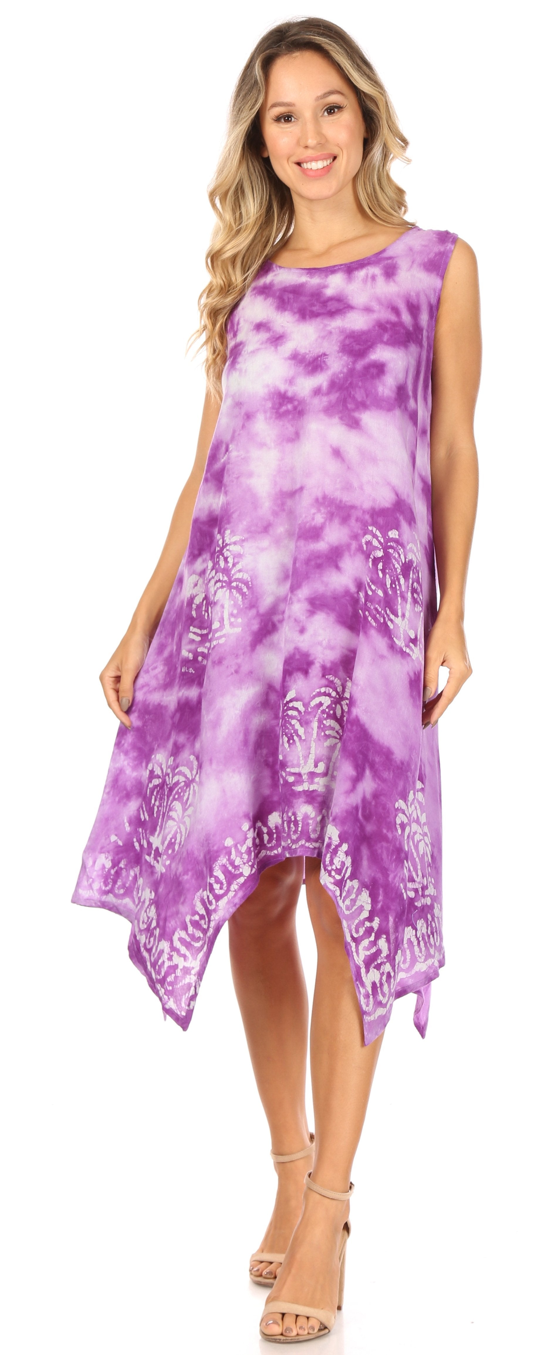 Woman wearing a purple tie-dye dress with a white background
