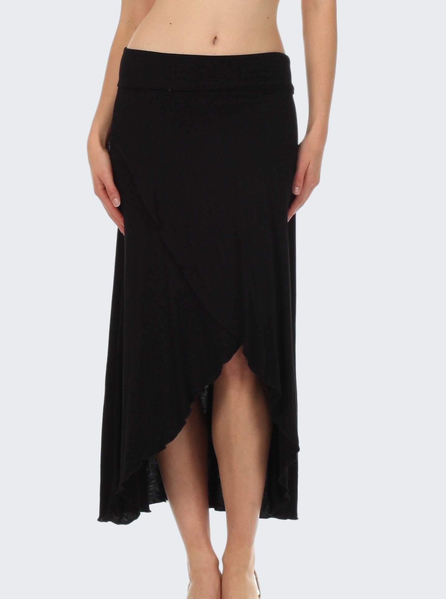 Black skirt worn by a person on a white background