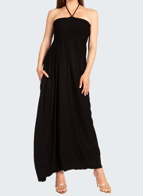 Black halter neck dress worn by a model on a white background