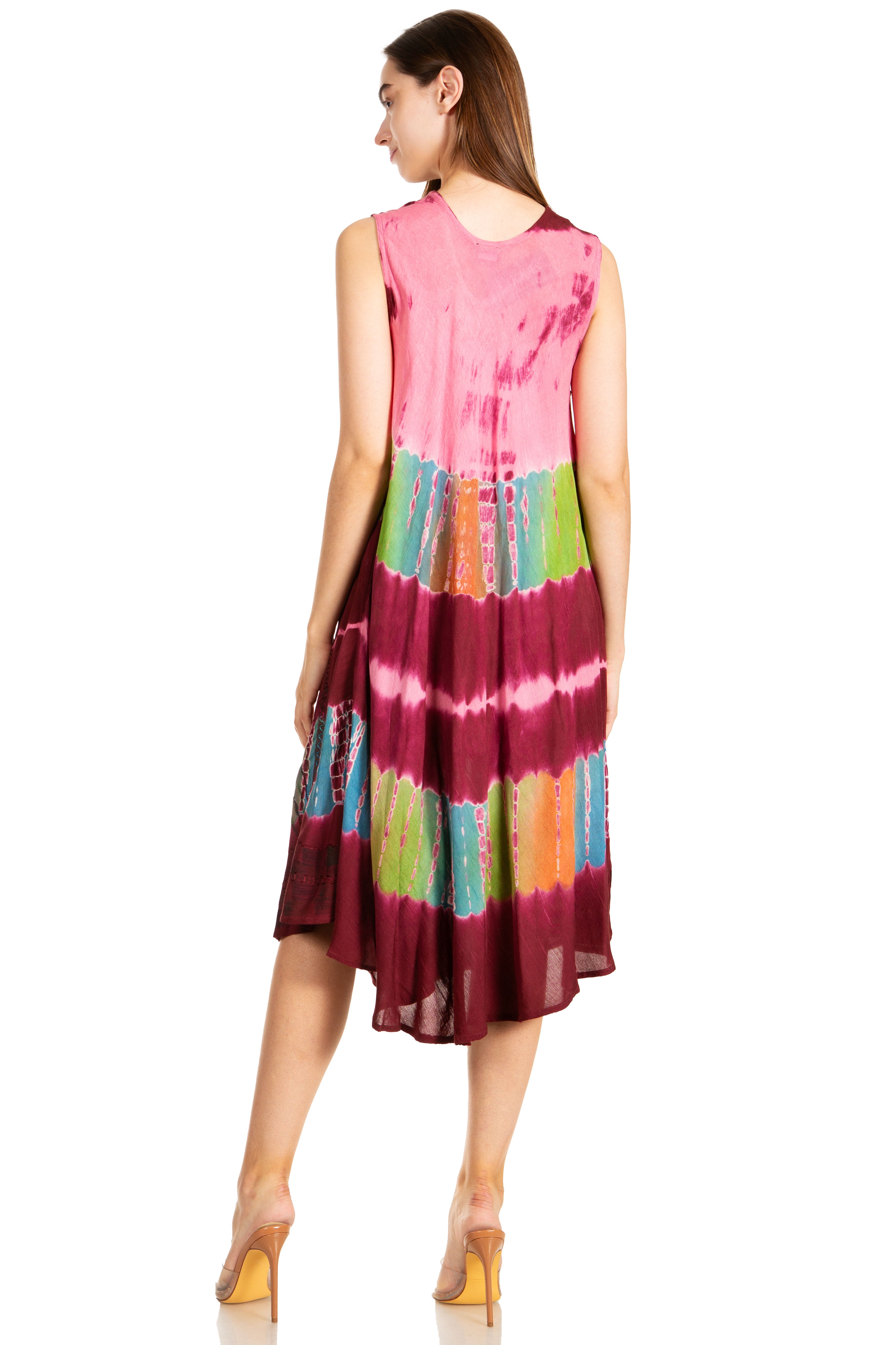 Woman wearing a colorful tie-dye dress on a white background