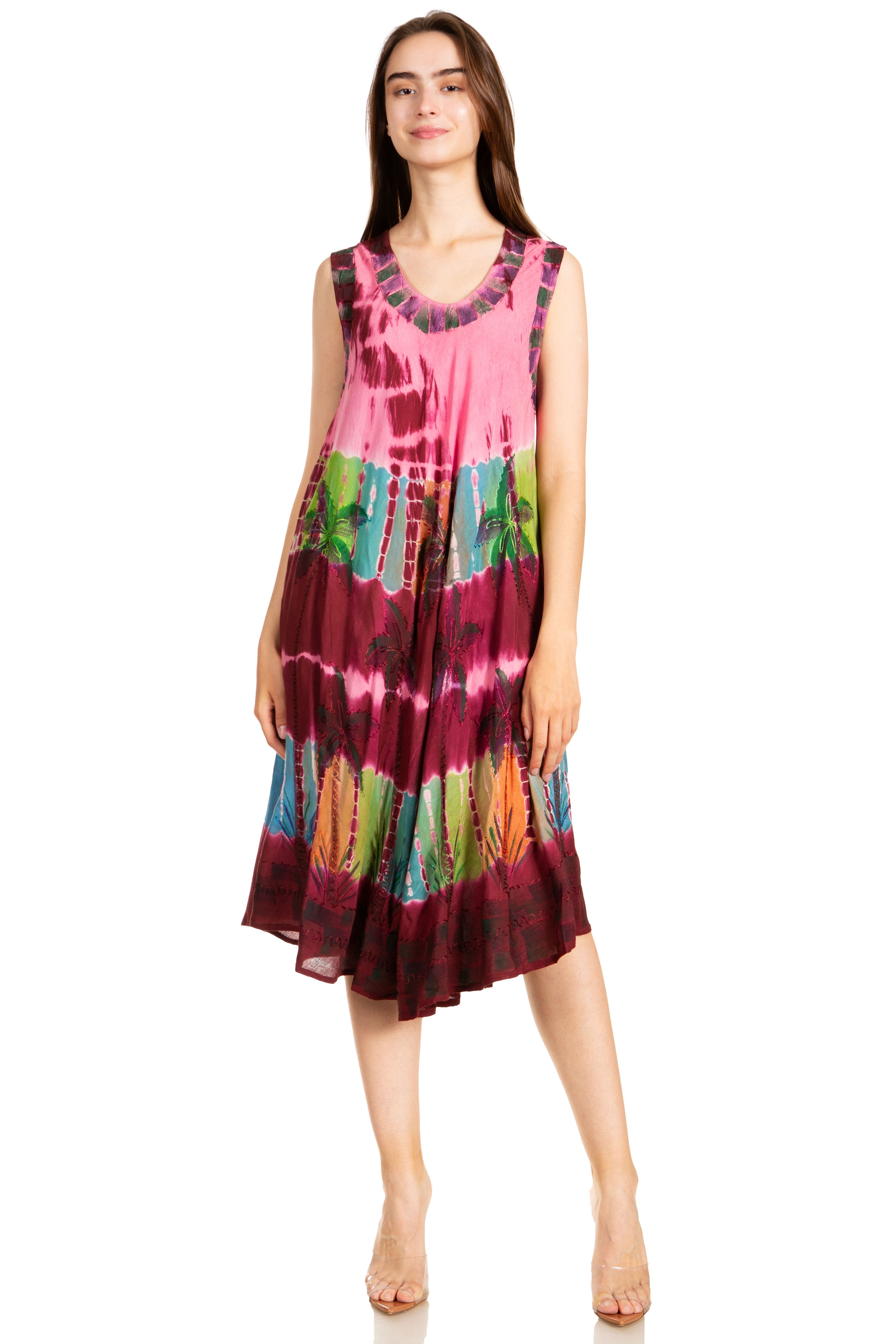 Woman wearing a colorful tie-dye dress on a white background