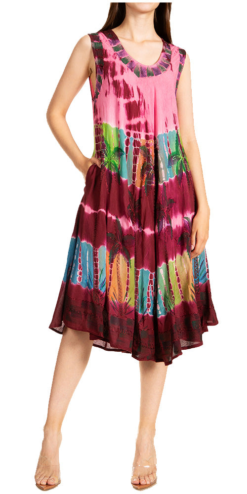 Woman wearing a colorful tie-dye dress on a white background