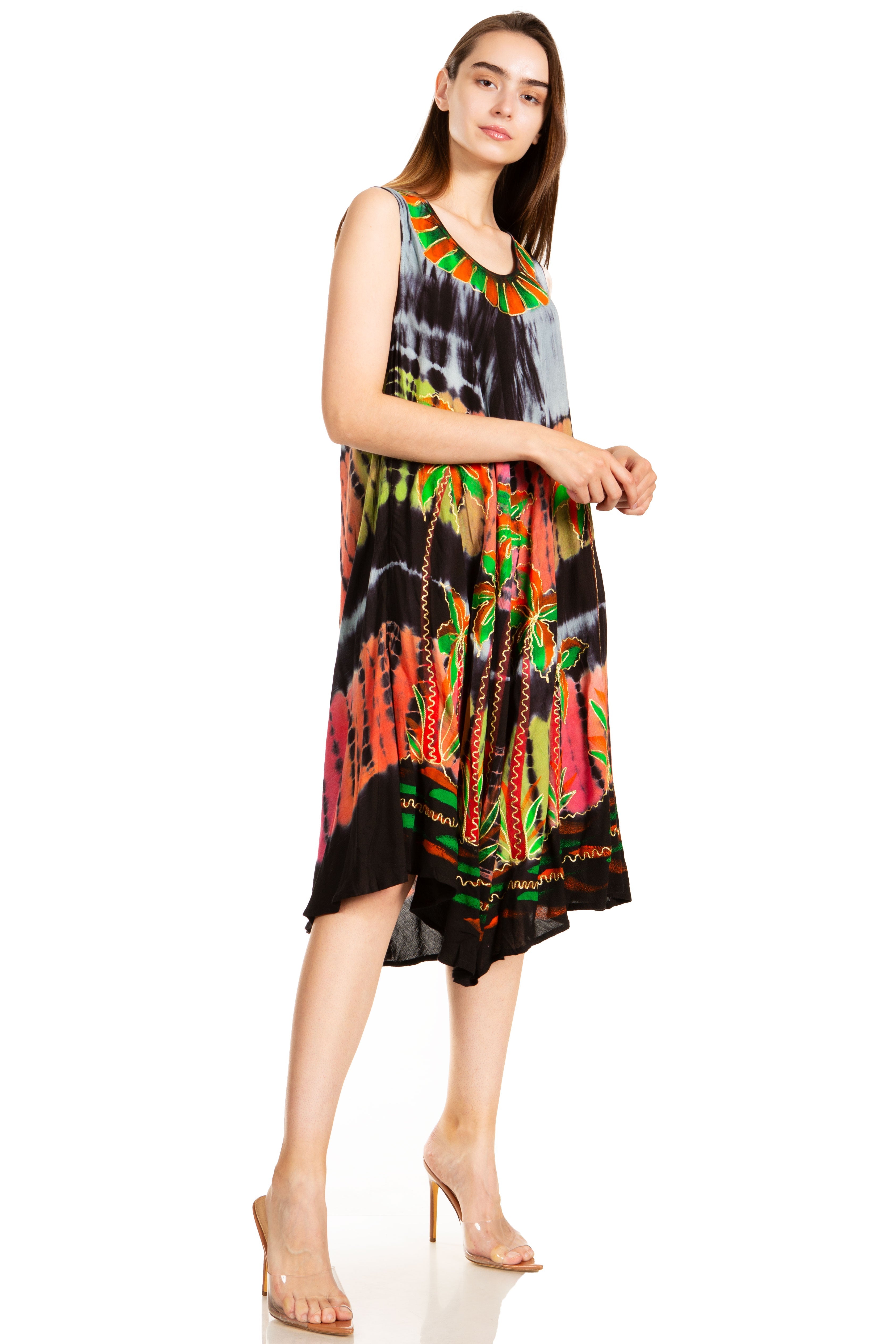 Woman wearing a colorful dress on a white background