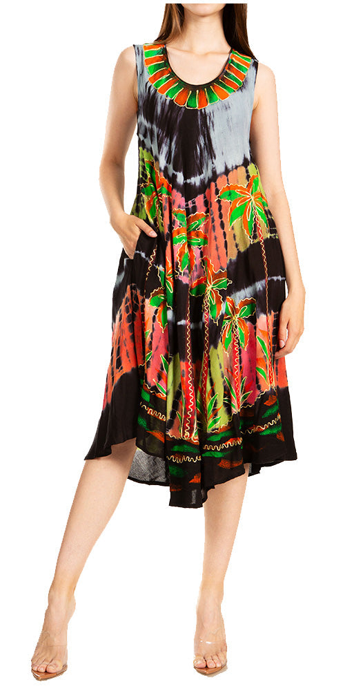 Woman wearing a colorful dress with a pattern on a white background