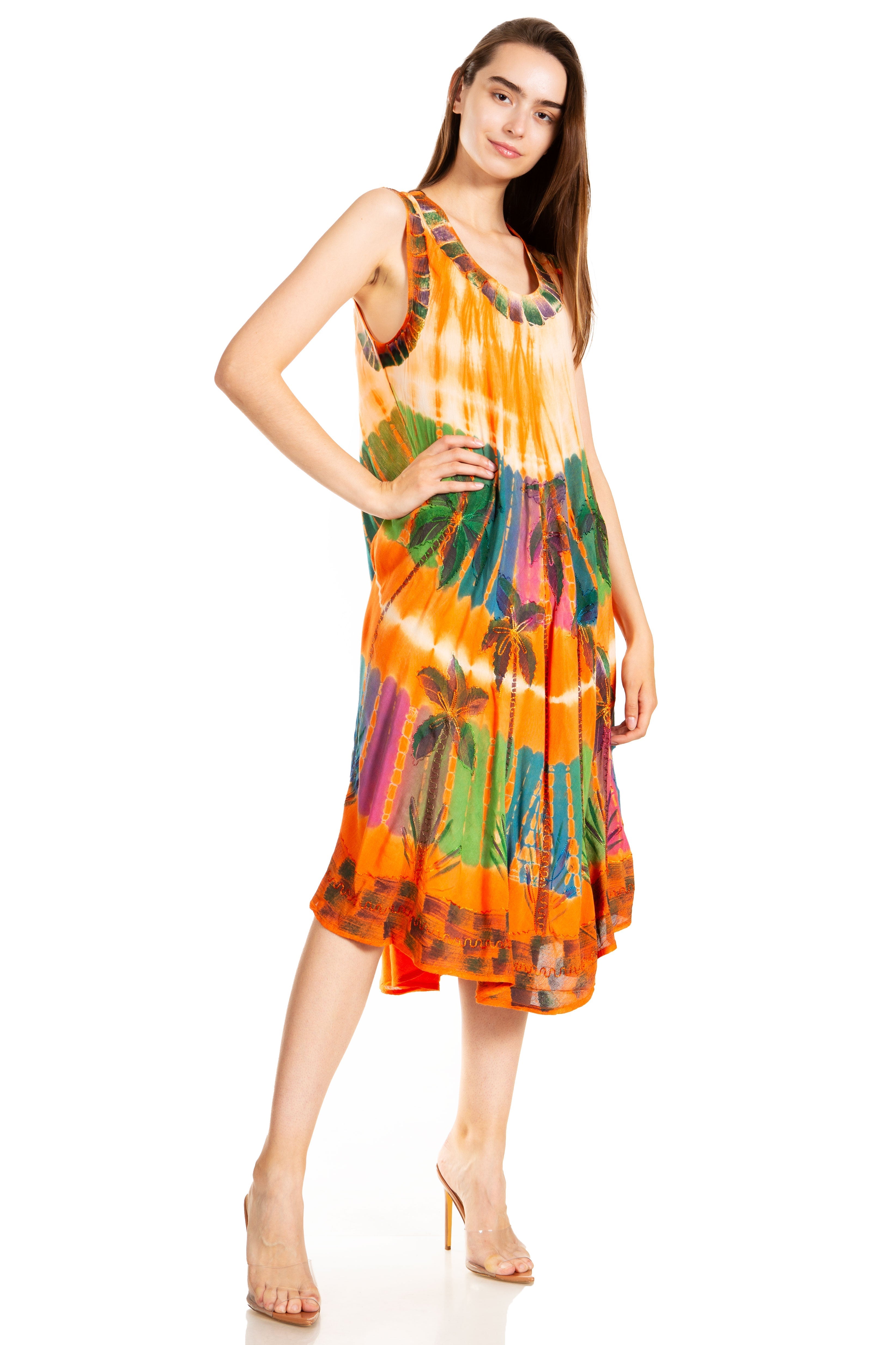 Woman wearing a colorful tie-dye dress on a white background