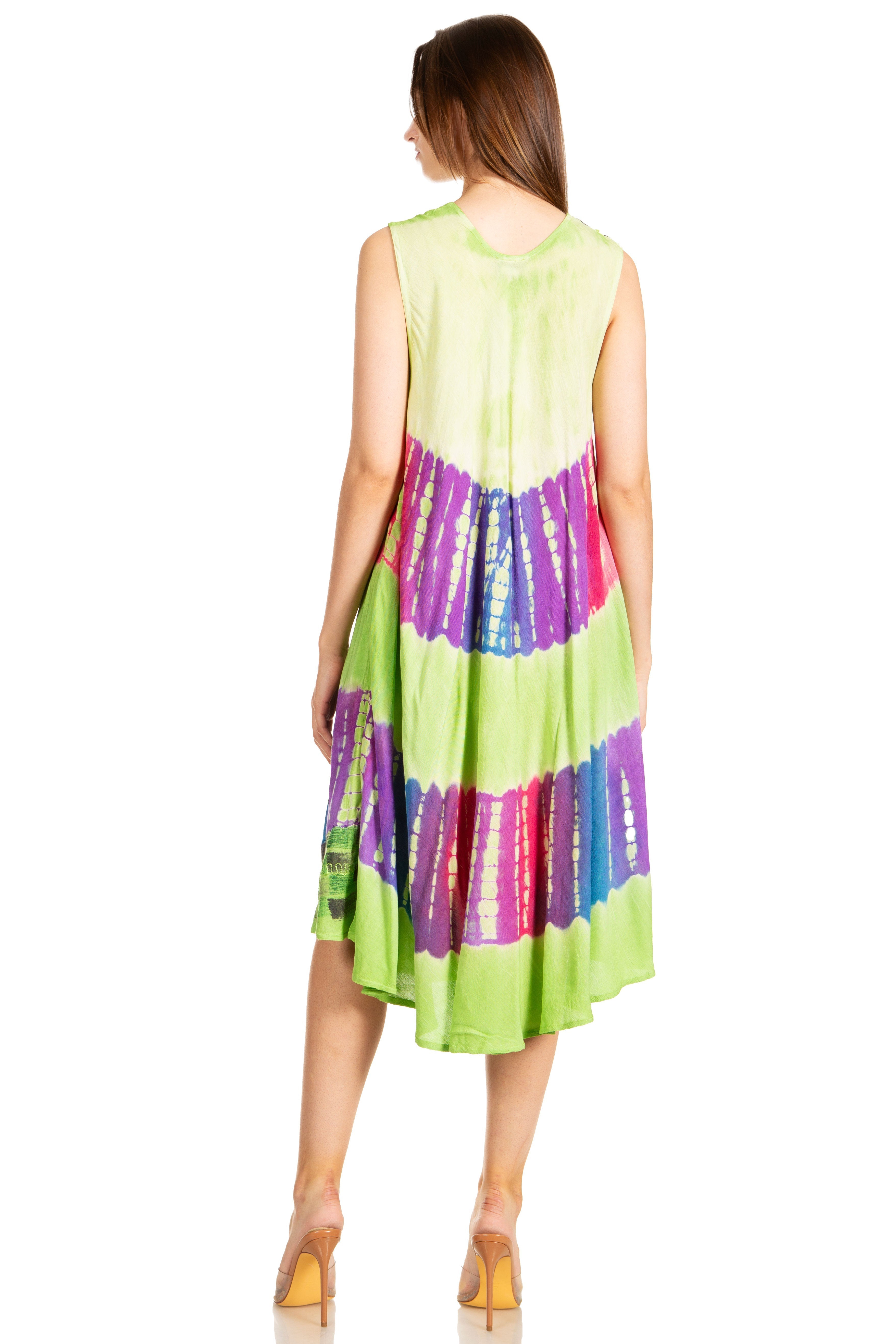 Woman wearing a colorful sleeveless dress with a tie-dye pattern on a white background