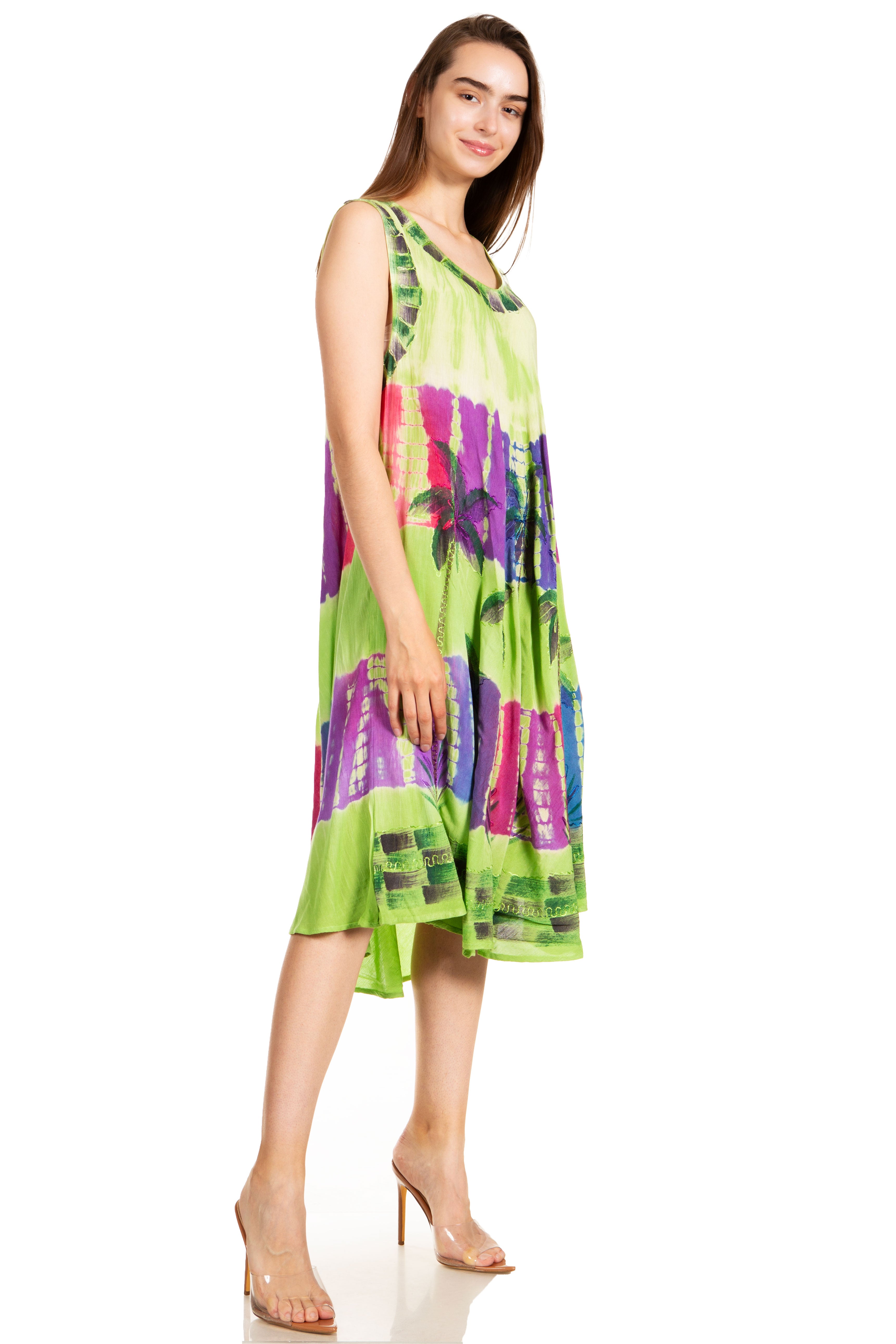 Woman wearing a colorful dress on a white background