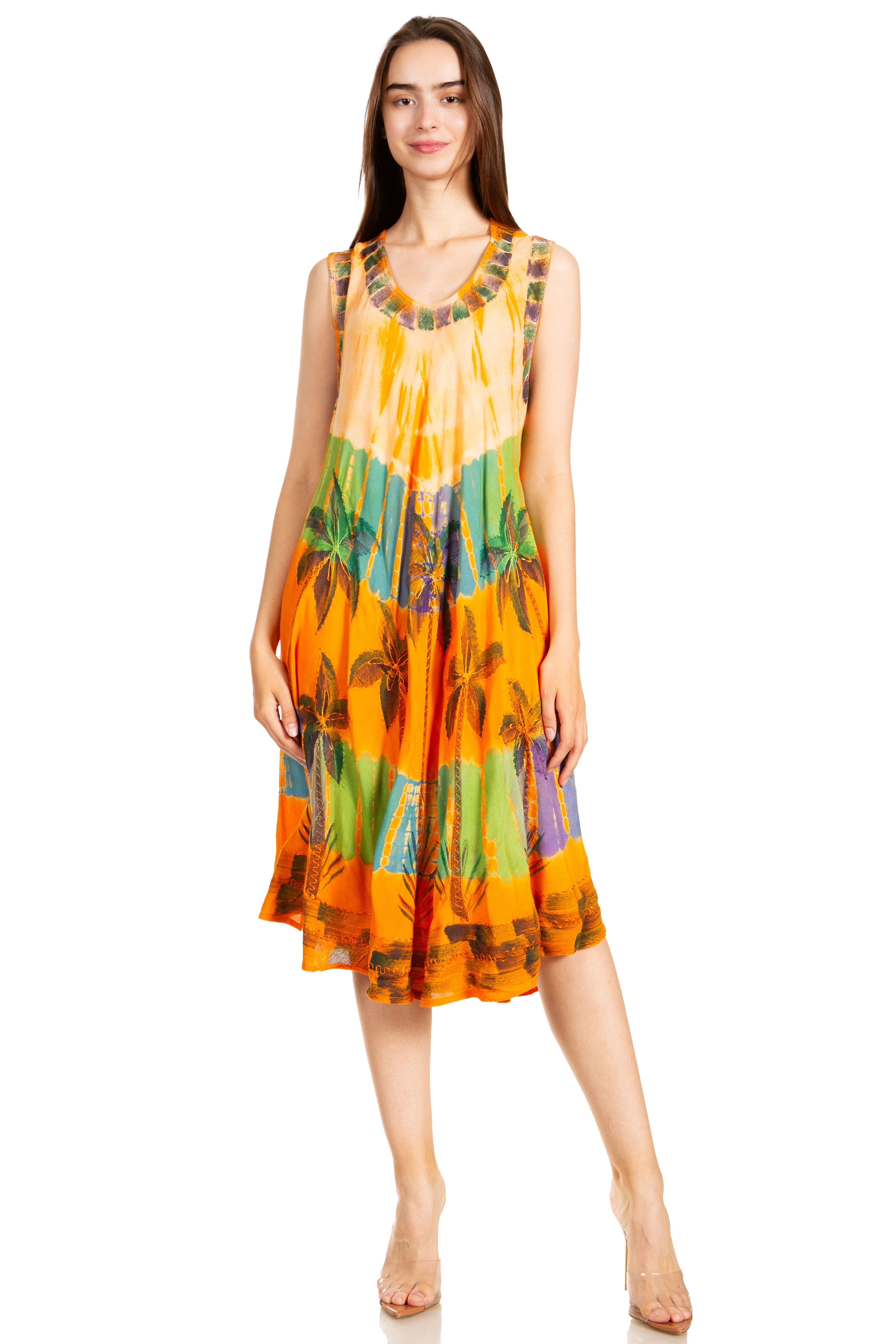 Woman wearing a colorful dress with a palm tree pattern on a white background