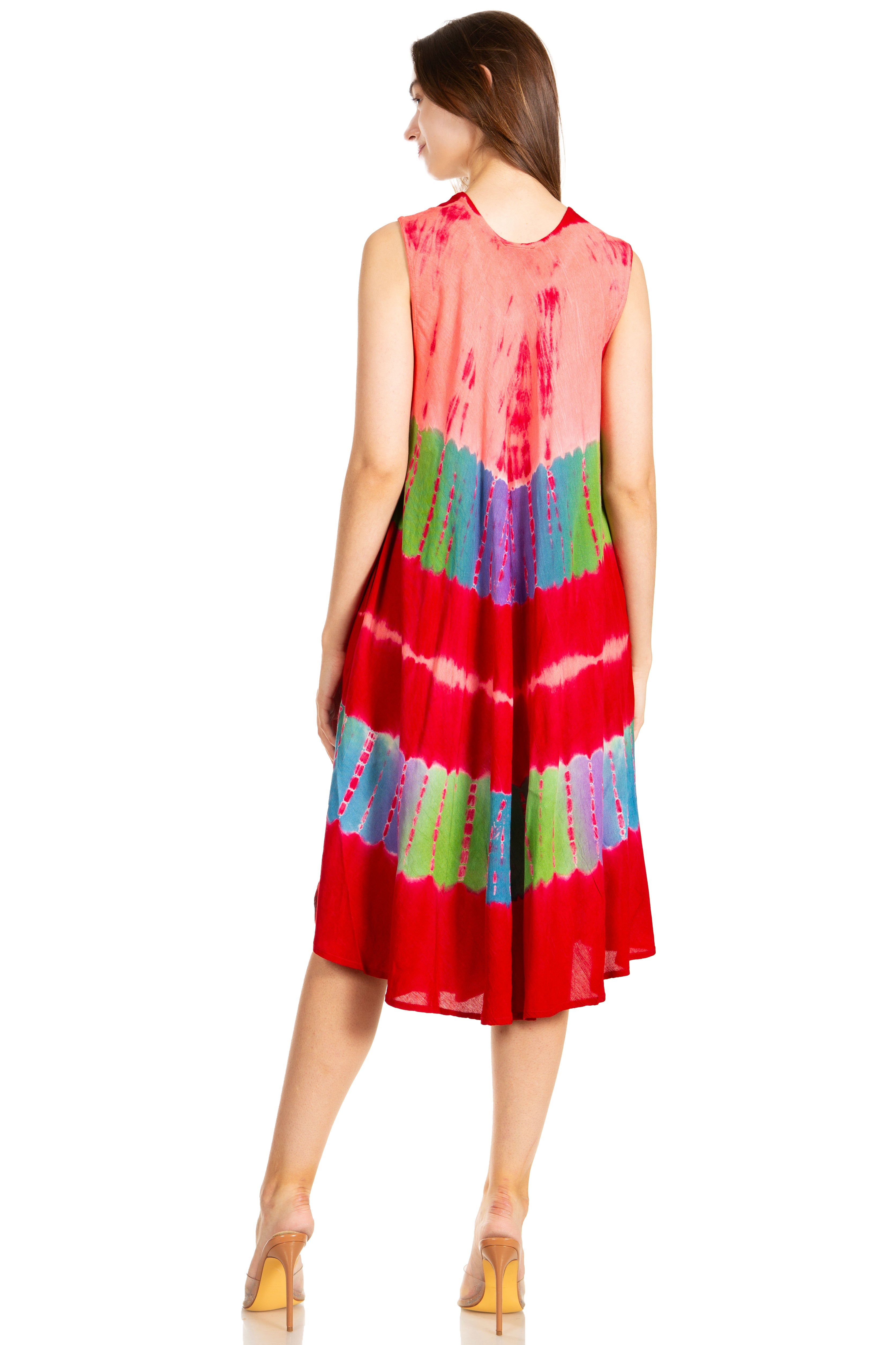 Woman wearing a colorful tie-dye dress on a white background