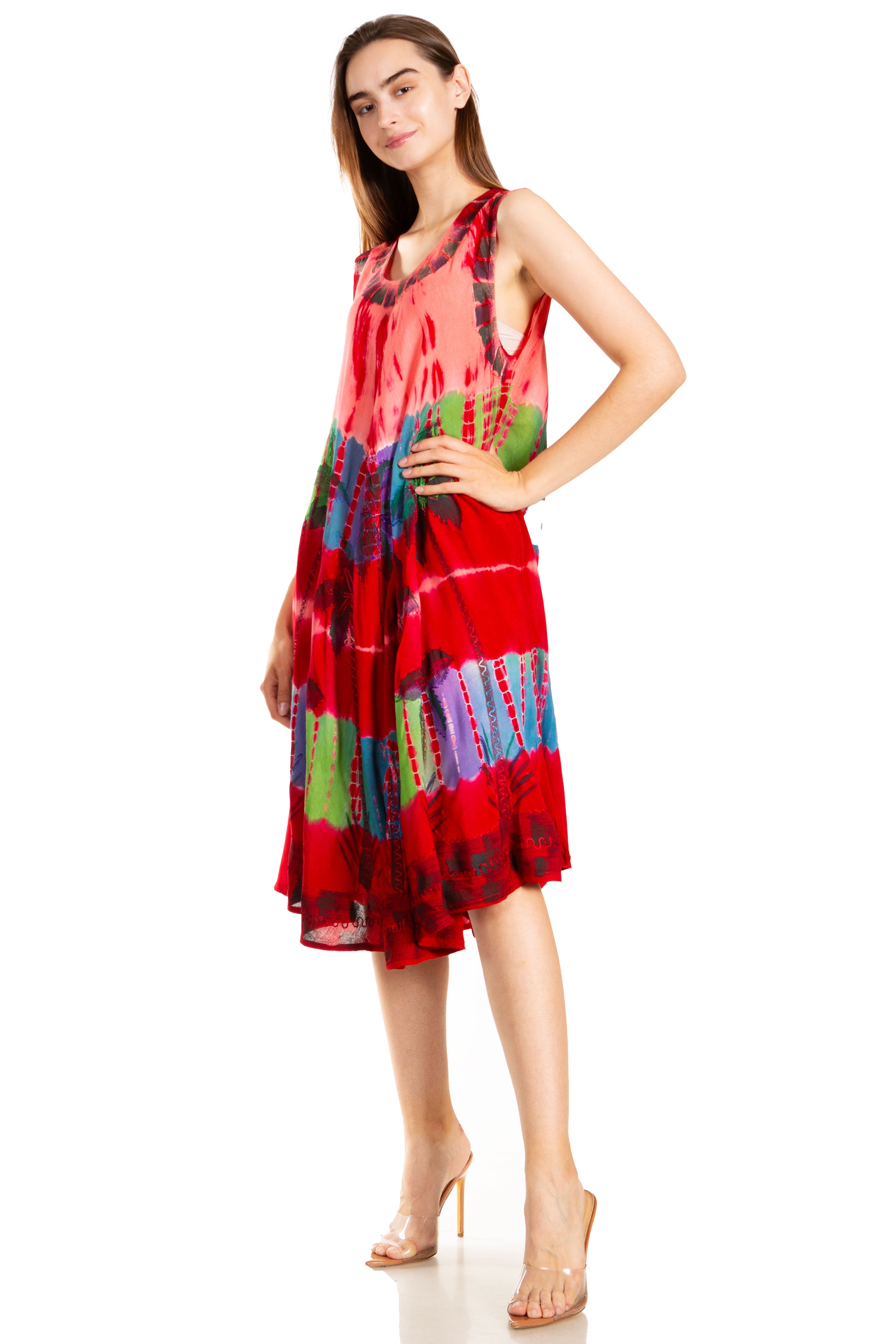 Woman wearing a colorful dress with a white background