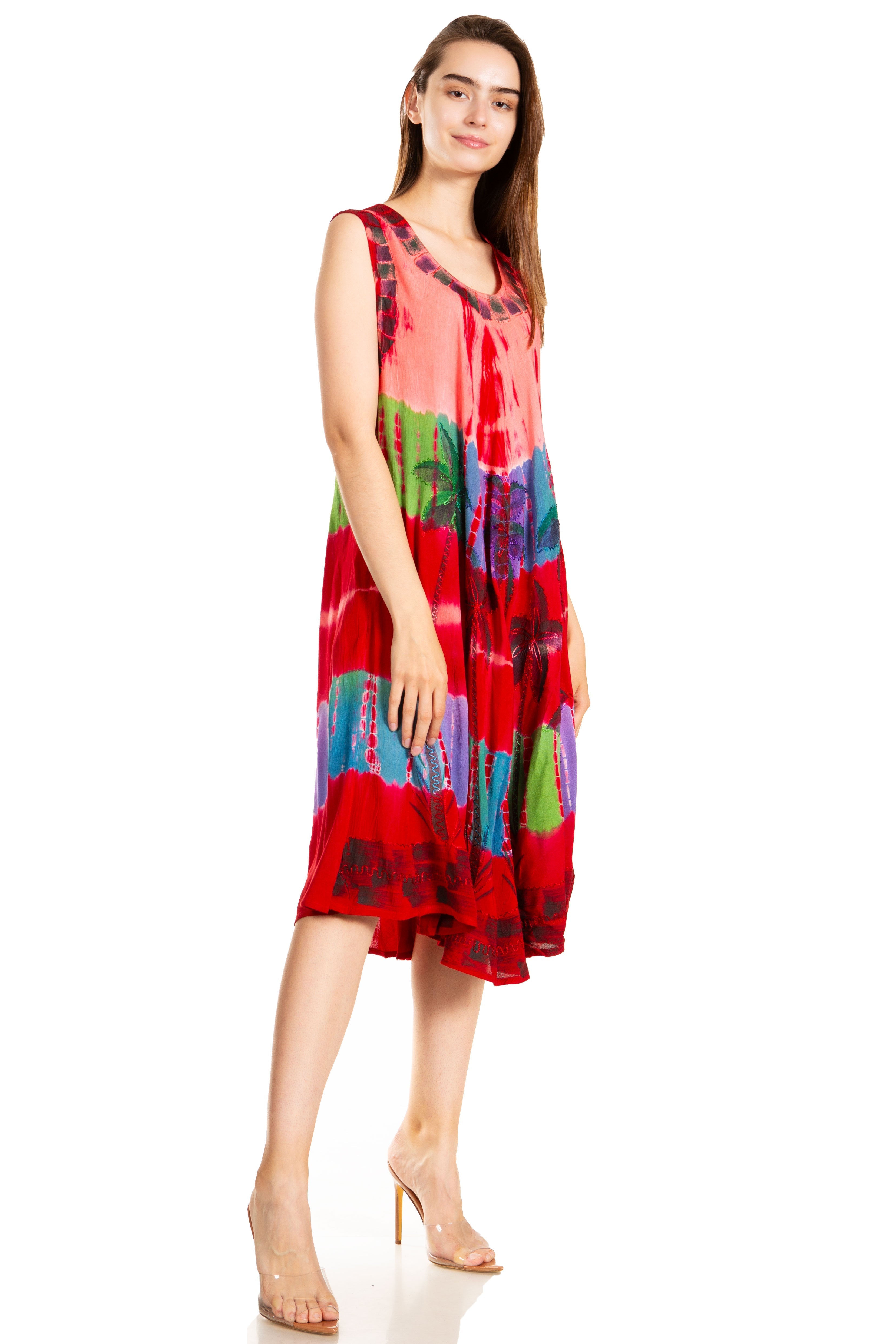 Woman wearing a colorful dress on a white background