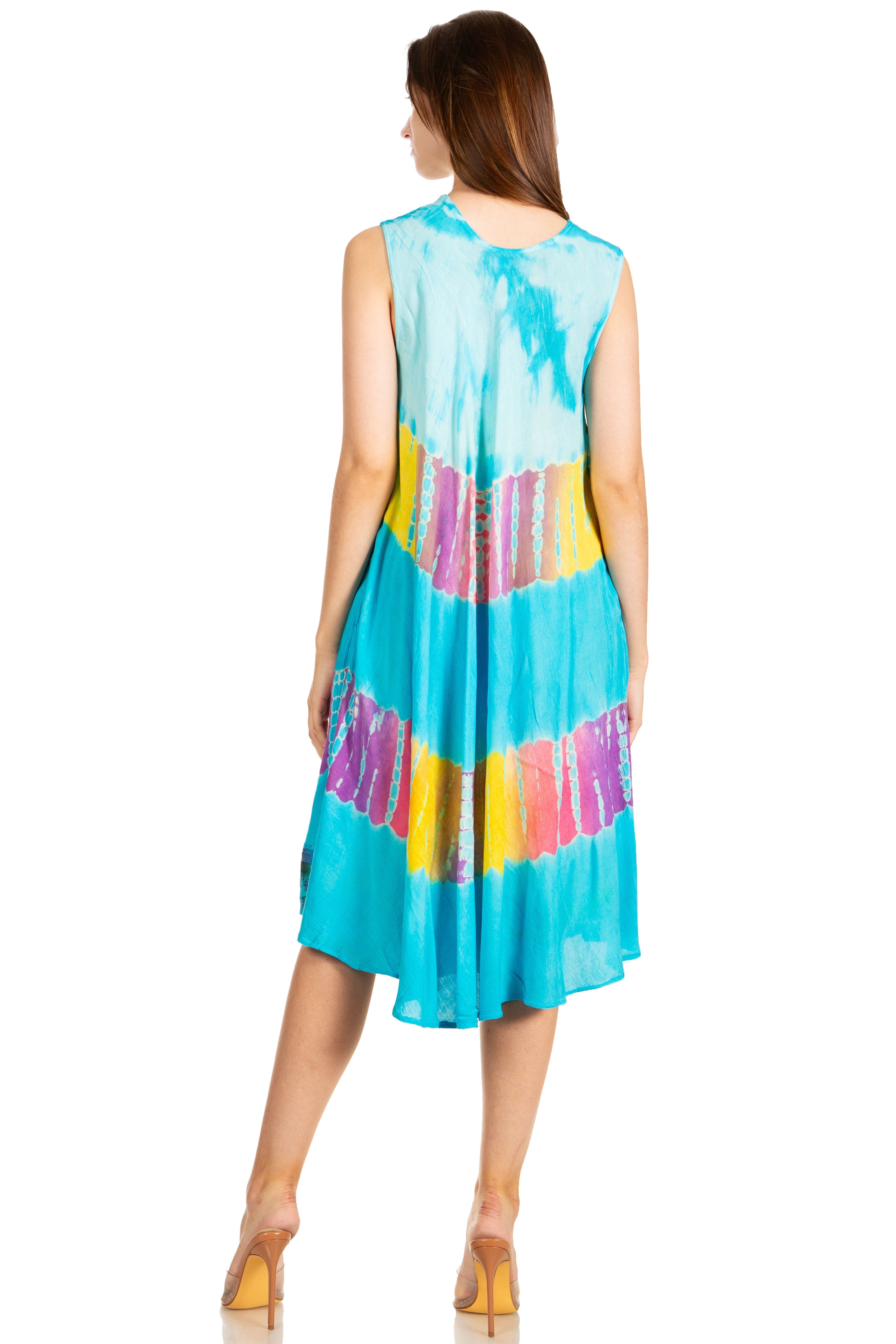 Woman wearing a colorful tie-dye dress on a white background