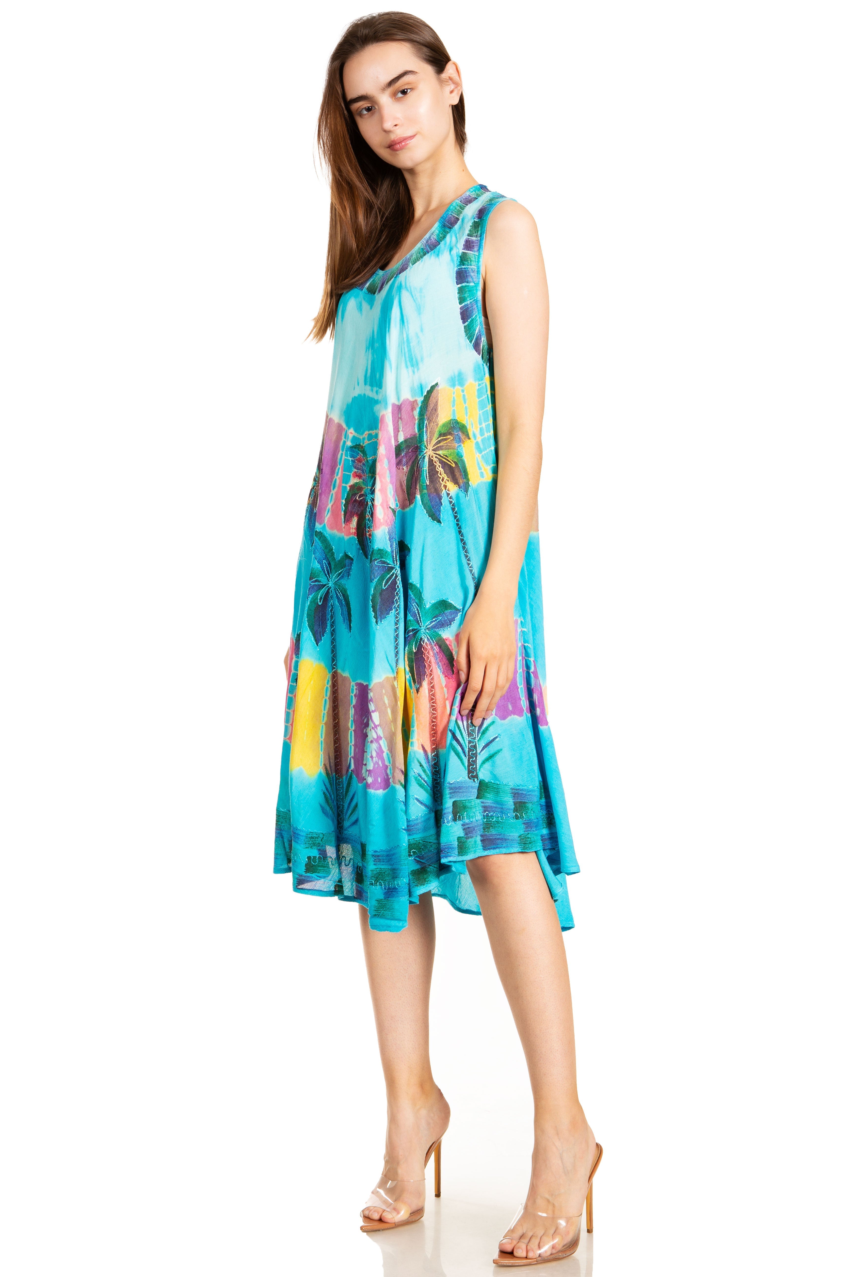 Woman wearing a colorful dress on a white background