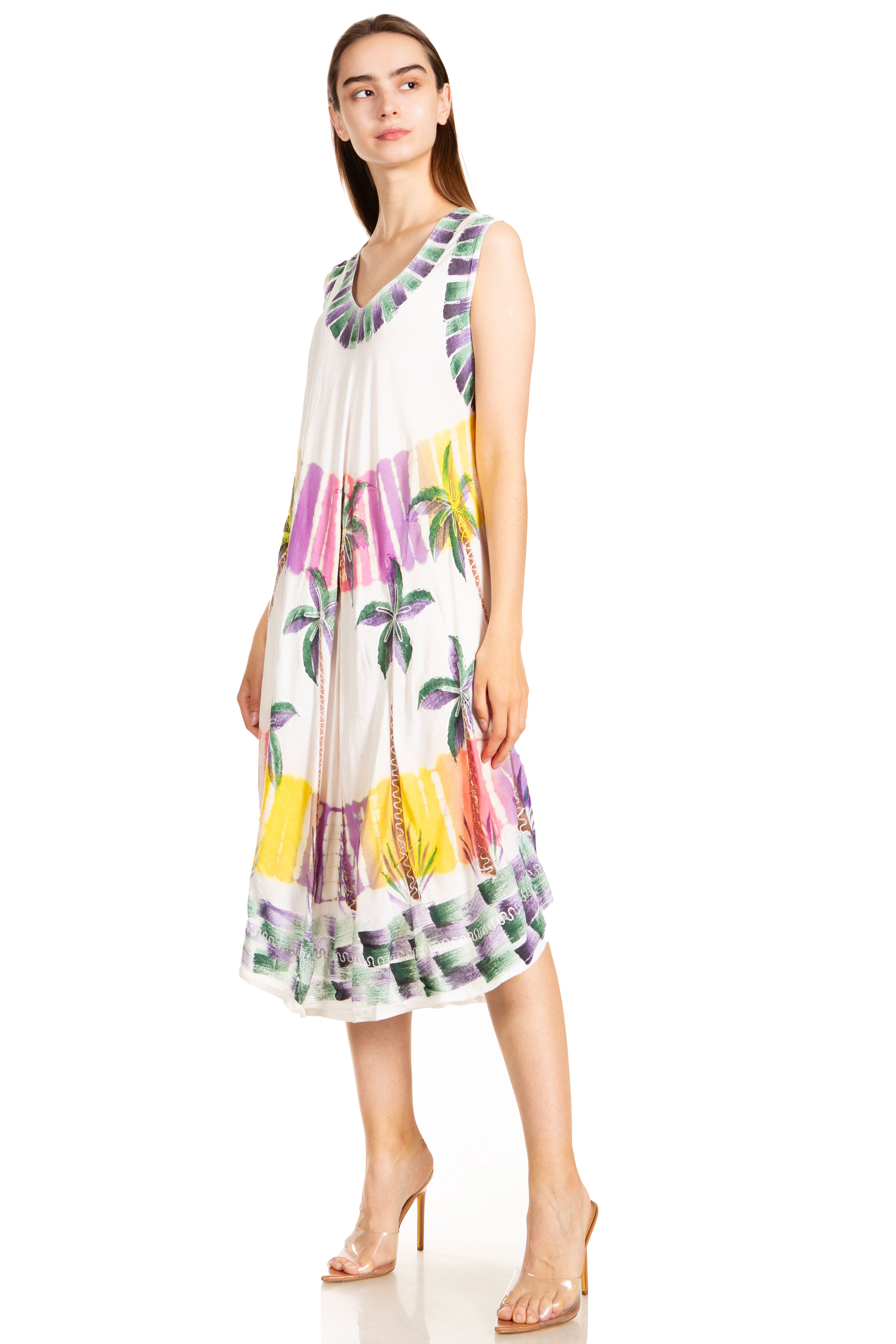 Woman wearing a colorful dress with a white background