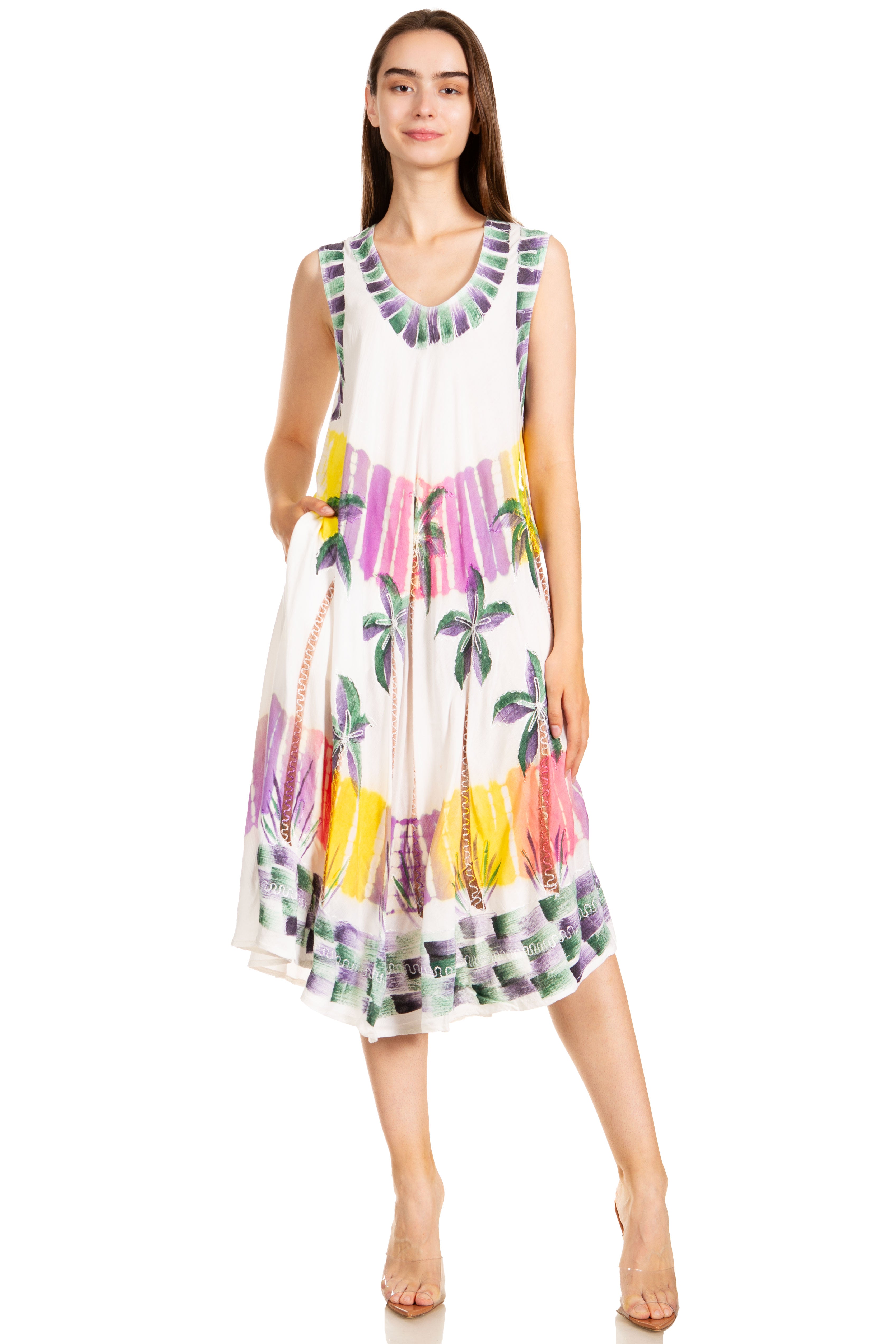 Woman wearing a colorful sleeveless dress on a white background