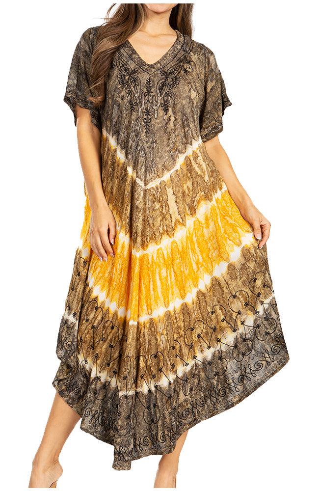 Woman wearing a tie-dye dress with brown, yellow, and white pattern on a white background