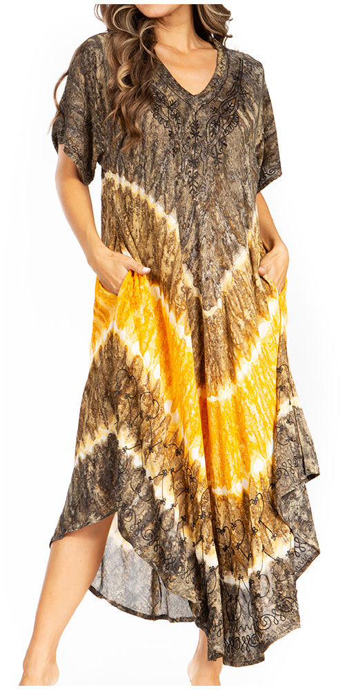 Long dress with tie-dye pattern in brown, orange, and beige on a white background
