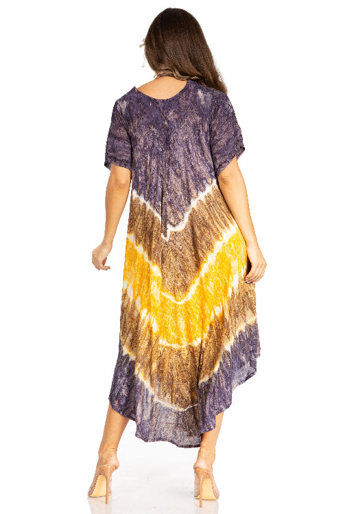 Woman wearing a tie-dye dress with a gradient from purple to yellow on a white background