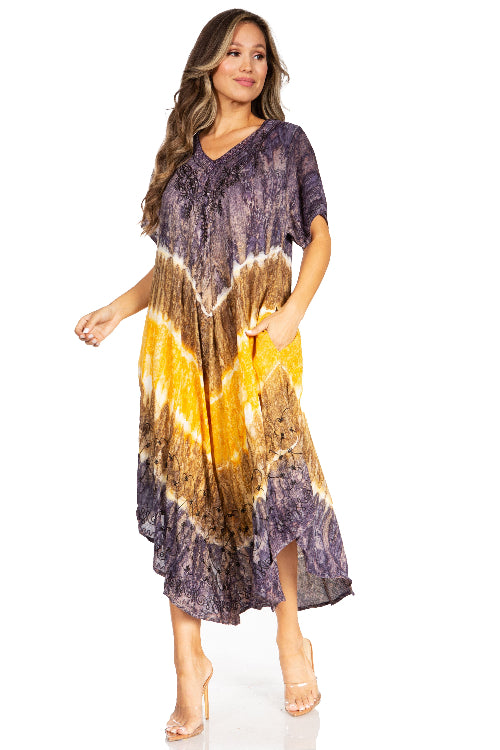 Woman wearing a tie-dye dress with purple, yellow, and brown colors on a white background