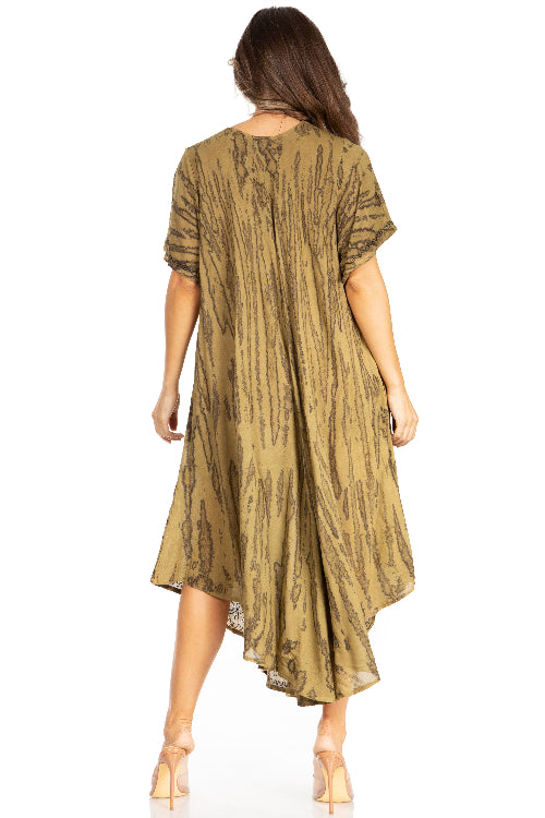 Woman wearing a patterned dress on a white background