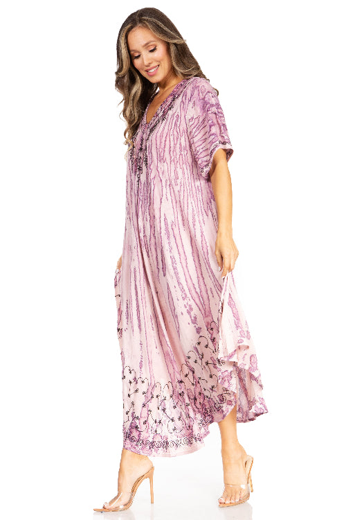 Woman wearing a pink floral dress on a white background