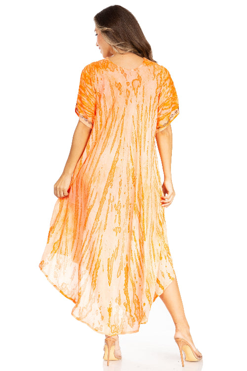 Woman wearing an orange tie-dye dress on a white background